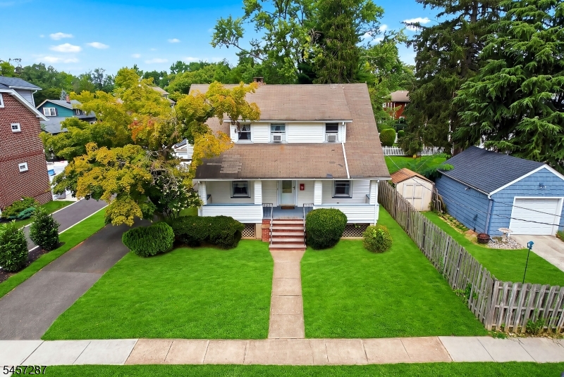 Charming Southside Cranford Dutch Colonial blends timeless character with inviting spaces and exciting potential. This four- five (4-5) bedroom, two (2) full-bath home features a welcoming layout, a cozy wood-burning fireplace, and a spacious eat-in kitchen ready for everyday meals, entertaining, and memorable gatherings. Enjoy morning coffee or evening relaxation on the covered front porch, then unwind or host guests on the rear deck overlooking the property. The flexible second-floor living area offers valuable versatility and could be transformed into a private primary suite, home office, studio, or additional recreation space. With classic architectural details, generous room to grow, and a desirable location close to Crantord's vibrant downtown, parks, schools, transportation, and community amenities, this special home presents an exceptional opportunity to create your ideal lifestyle.