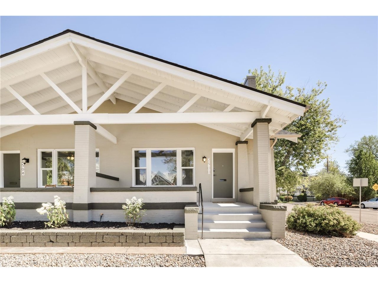 Charming Historic Craftsmanship & Income Potential in Whittier! Welcome to this 1910 historic brick gem, perfectly set on a sunlit, southeast-facing corner lot in one of Denver's most coveted historic neighborhoods. Thanks to its prime southern and eastern exposure, you will enjoy brilliant natural light all day long alongside the ultimate Colorado perk: quick, effortless snow melt on your driveway, steps, and sidewalks during Denver winters. Elevated above street level, the inviting wide front porch sets the stage for classic Denver outdoor living.Step inside to discover original wood floors, a decorative brick fireplace, custom built-ins, and craftsman architectural columns leading into a formal dining room complete with a built-in window bench seat. The main floor features an updated kitchen with granite countertops, two bedrooms (including one with an en-suite bath), a full guest bath, and a dedicated laundry/mudroom leading out toward the back.The fully finished lower level offers incredible flexibility with its own private exterior entrance, fresh LVP flooring, full egress windows, two additional bedrooms, a full bathroom, and a bonus living area. It is primed and ready to operate as a house-hack, guest suite, long-term rental, or short-term rental setup (buyer to verify Denver STR guidelines). With minimal yard upkeep and a brand-new roof from August 2026, you can spend your weekends enjoying the city rather than maintaining the property.Enjoy an ultra-central, highly walkable location just blocks from local favorites like Whittier Cafe, Fuller Park & Dog Park, The Whittier Pub, Point Easy, City Park Golf Course, and the Denver Zoo. With a 71 Walk Score and 95 Bike Score, you have a fast, effortless commute to RiNo, Five Points, Downtown, and LoDo. This rare end-unit property combines historic charm, modern updates, quick snow melt, and serious income flexibility!