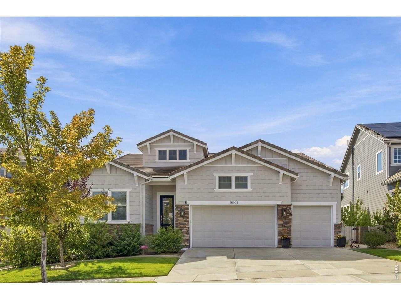 Just in time for the end of summer, this beautifully maintained Anthem Highlands ranch reminds you why this community is so special. Thoughtfully updated & designed for comfortable main-floor living, it offers an ideal blend of elegance, function, & convenience. With 4,588 square feet, 3 bedrooms (office is non conforming), 2.5 bathrooms, a huge unfinished basement, & a finished 3-car garage, this home offers flexibility for every stage of life. Inside, natural light fills the open layout, complemented by fresh paint, updated LED & recessed lighting, & new engineered hardwood flooring in the primary suite & office. The kitchen features quartz countertops, soft-close cabinetry & drawers, a glass cooktop with induction, double ovens, built-in speakers, abundant storage, & a refrigerator. The adjoining dining & living spaces flow beautifully together, anchored by a cozy gas fireplace & high ceilings. The spacious primary retreat offers a coffered ceiling, a luxurious 5-piece bath with new shower glass, custom closet build-outs, & one of three Toto toilets. Additional upgrades include built-in shelving, ceiling fans, a smart Ecobee thermostat, & a Ring security system with exterior cameras, sensors, motion detectors, & glass-break protection. Step outside to landscaped grounds, garden beds, a covered deck with a gas line for grilling, & a backyard shade awning ideal for Colorado evenings. Other highlights include a tankless water heater installed about two years ago, fully paid-off solar panels lowering electric bills, radon mitigation, window well covers, a smart LiftMaster garage opener, epoxy garage floors, a 220-volt outlet, finished garage walls, a garage fan, an additional refrigerator in the garage, & included washer & dryer. In sought-after Anthem Highlands, residents enjoy mountain views, miles of trails, parks, open space, a community center, fitness facilities, swimming pools, & convenient access to schools, shopping, dining, & major commuter routes.