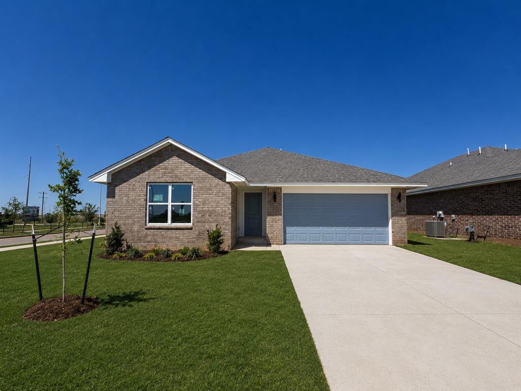 This home features the community’s largest floor plan at 1,600 square feet and four sides of brick, offering four bedrooms and two baths designed for modern living. The open-concept living area flows seamlessly into the dining and kitchen spaces, which include generous counter space, quartz countertops, and an oversized utility/pantry area. The oversized primary suite provides privacy, while three additional bedrooms offer flexibility for guests, offices, or hobbies. A covered back patio extends the living space outdoors. Premium upgrades rarely found in nearby new builds include a pre-piered foundation engineered for Oklahoma soil, tornado safety straps, Class 3 impact-rated shingles, Uponor PEX plumbing, and a Navien tankless water heater. These features are built for durability, safety, and lower long-term costs, and they are backed by a 10-year structural and foundation warranty. Located just off 89th and Eastern with easy access to I-240 and I-35, Sweetwater is 15minutes from Tinker Air Force Base, 22 minutes from the University of Oklahoma, 15 minutes from Will Rogers Airport, and just 3 minutes from the nearest school.