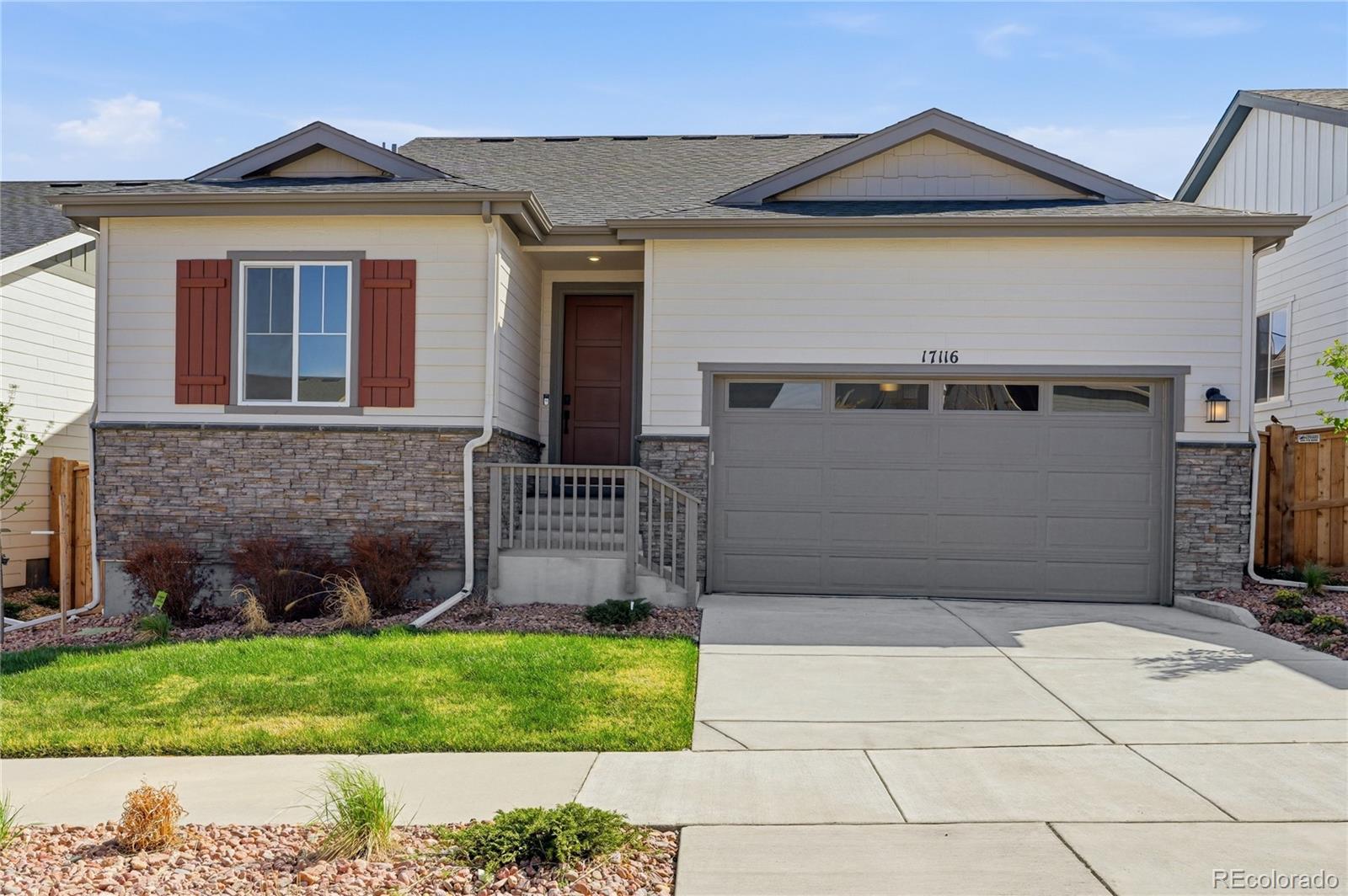 What's Special:  3 Bedrooms on Main | Large Kitchen Island | Backs to Open Space.  New Construction - Ready Now! Built by America's Most Trusted Homebuilder. Welcome to the Emerald Lake at 17116 W 92nd Loop in Trailstone City Collection. This thoughtfully designed new home blends elegance with practicality for a low-maintenance lifestyle. At the front of the home, you’ll find two secondary bedrooms and a full bath, creating a private retreat for guests. The open-concept living spaces are perfect for entertaining, featuring a generously sized kitchen with an extended island complete with cabinets for extra storage. The kitchen overlooks the natural light filled great room and dining area. The primary suite is tucked at the back of the home and offers a spacious walk-in closet and dual vanity bath. Head downstairs to the finished basement, where you’ll discover an additional bedroom, full bath, a large rec room, and plenty of storage space. Trailstone is a new home community on the edge of the Rocky Mountains in Arvada, CO. Just off Candelas Parkway and only 15 miles from Boulder, this neighborhood offers stunning views of Downtown Denver, the Rocky Mountains, and Standley Lake. Planned amenities include an outdoor pool and pickleball courts, giving you endless opportunities to stay active and connect with neighbors. With spacious backyards and incredible scenery, every day at Trailstone feels like an adventure. Additional Highlights Include: Finished basement, extended kitchen island, cabinets at kitchen island, door at primary bed to bath, soft close drawers and doors, and slide-in gas range in place of electric range. MLS#2354511