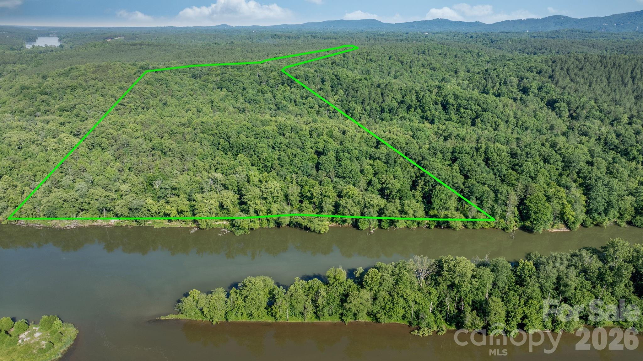 Discover the possibilities with this exceptional 90+ acre property in Burke County! Offering 1,140 feet of shoreline along Lake Rhodhiss and the Catawba River, this unrestricted tract is a rare opportunity for investors, developers, outdoor enthusiasts, or anyone dreaming of a private waterfront retreat.With its own private access from Huffman Bridge Road, the property features abundant wildlife, peaceful surroundings, and a gently sloping shoreline that provides easy access to the water. With no city taxes and no known restrictions, the possibilities are nearly endless—create a family estate, develop a waterfront community, establish a recreational getaway, or simply enjoy the privacy and natural beauty.Whether you're looking for a quiet escape or your next development opportunity, this remarkable property offers the acreage, waterfront, and flexibility to bring your vision to life.Boat tours/atvs available upon request.