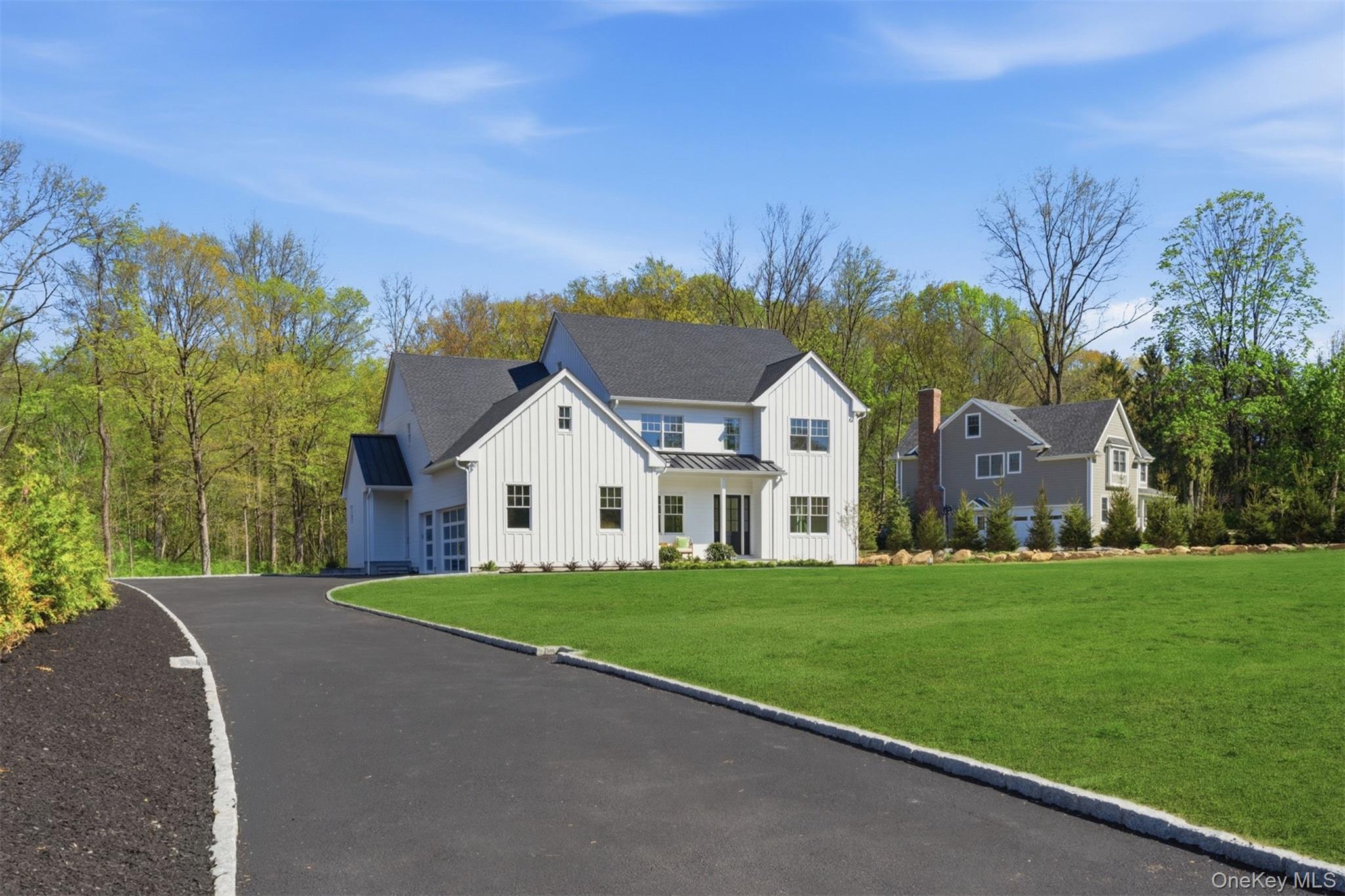 Introducing an Extraordinary New Construction Masterpiece in the heart of Armonk. Crafted by one of Westchester's most sought-after luxury builders, this exceptional timeless elegant residence is ready for you. Perfectly sited on a rare, flat and private parcel set back from the road just minutes from town, this home offers the ideal blend of seclusion and convenience on over 2.5 level acres.Designed with today’s modern buyers in mind, the floor plan flows effortlessly, balancing grand entertaining spaces with intimate everyday living. Every inch is finished with the highest level of detail, from designer fixtures to custom millwork and state-of-the-art appliances. A true showcase of quality and sophistication, this is more than a home, it’s a lifestyle and not to be missed. At $2,689,000 this home represents one of the strongest opportunities to own new construction of this caliber in Armonk!