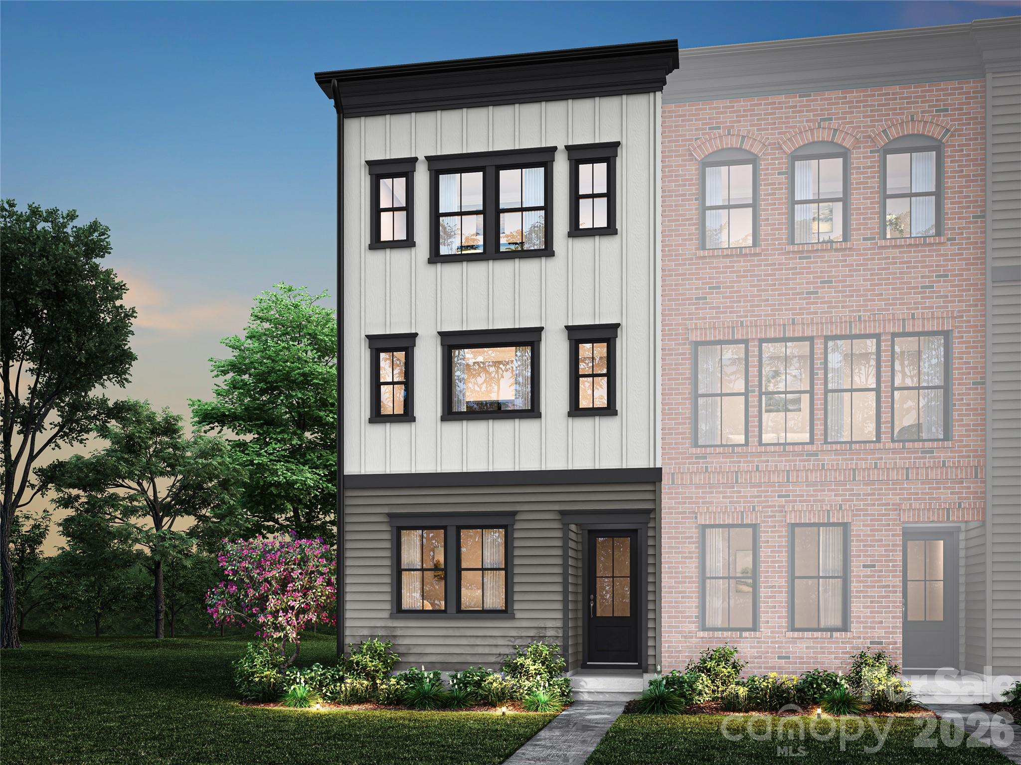 Enjoy elevated townhome living in this three-story home nestled in a tree-framed neighborhood within walking distance of historic downtown Waxhaw. Offering 3 bedrooms, 2 full baths and 2 half baths, this thoughtfully designed home balances flexible living with inviting spaces to unwind. The open-concept second floor centers around a gourmet kitchen with appliances, flowing into the great room and a covered balcony with an electric fireplace and an expansive 12-foot sliding glass door. Upstairs, the primary suite features a tiled walk-in shower with a ceiling-mounted rain head, while the secondary bath offers tiled walls above the tub. A first-floor flex room with double French doors provides space for a home office or creative retreat. A 2-bay rear-load tandem garage and laundry closet with washer and dryer add everyday convenience.