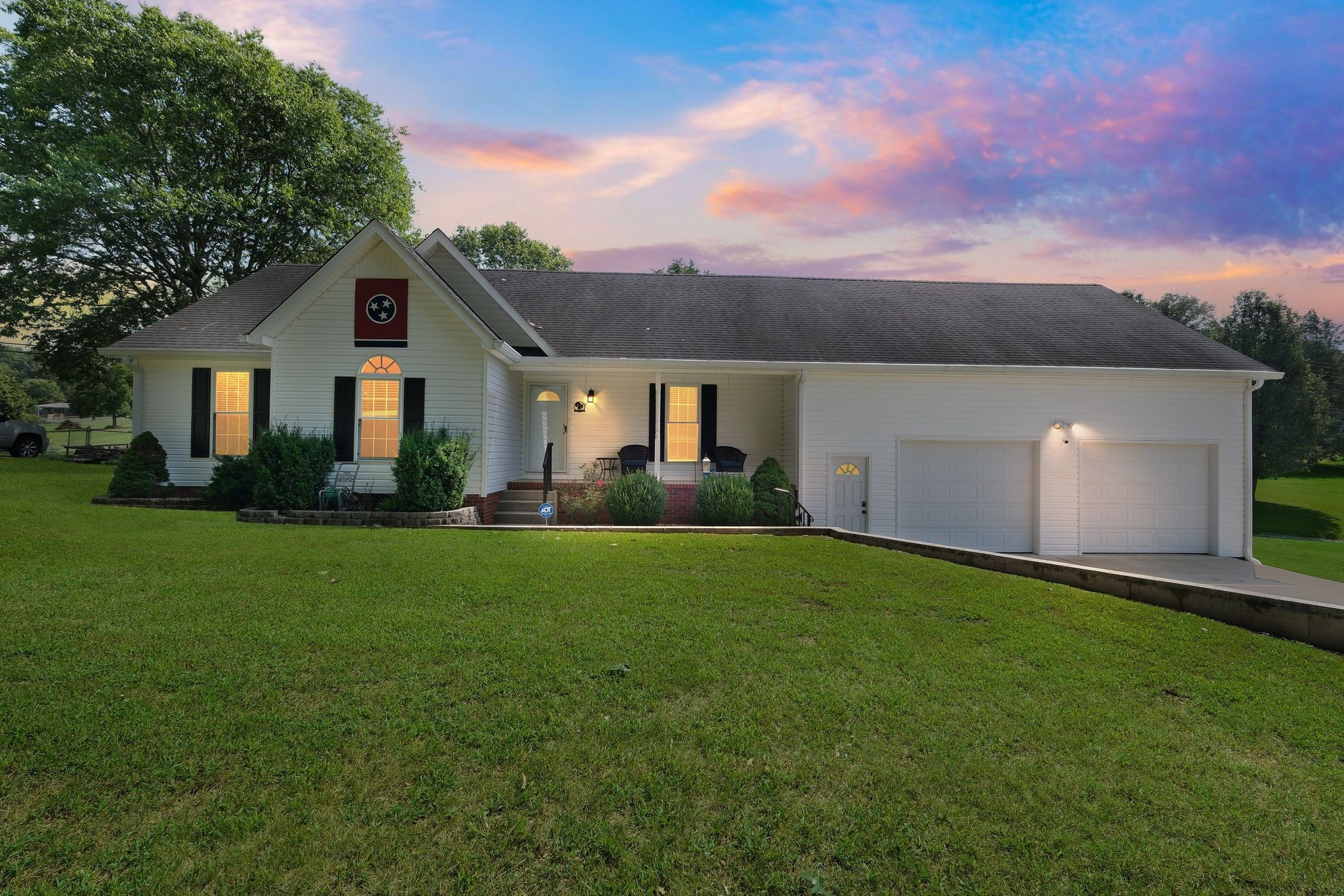 This home has so much to offer and is in a great location. You will definitely notice the pride and care that the current owners have put into all the details of this property. Enjoy a beautiful view of the country side from your front porch. This home is still only minutes from the town of Cathage for all your general needs. Less then 10 minutes away you will also find Defeated Creek Campground and lake for swimming, fishing and recreation. The current owners have taken real pride in this home. The front of this beautiful home is well manicured with large shade trees and real curb appeal. The driveway is concrete with a separate concreted area for extra parking. A large welcoming front porch awaits with views of the horses across the way. As you come in you will notice brand new carpet that has just been installed. HVAC and split air unit for the second story have been installed in 2023. A new tankless water heater has been installed. The septic has been serviced and pumped. The large Primary bathroom also has just been fully updated with double vanities and a large stand in shower. The kitchen is large for ample space to be able to entertain. There has been a gas stove added as well for your cooking needs. There is a huge loft over the garage to enjoy with its own split air unit for comfort.  The attached garage is oversized, finished and functional. There is a ton of space for your vehicles and extra storage. Off the back you will find a large covered deck, ideal for BBQ'S or even just morning coffee. The neighborhood is well maintained and peaceful.  A chain link fence has been installed in the back of the home offering security for your children or pets while they play. Within the fence you will also find a new she shed or mancave that has been finished. This building has been insulated, its own separate window air unit, new flooring and paint. There is another shed at the rear of the property that will remain. I cant wait for you all to see this home!!