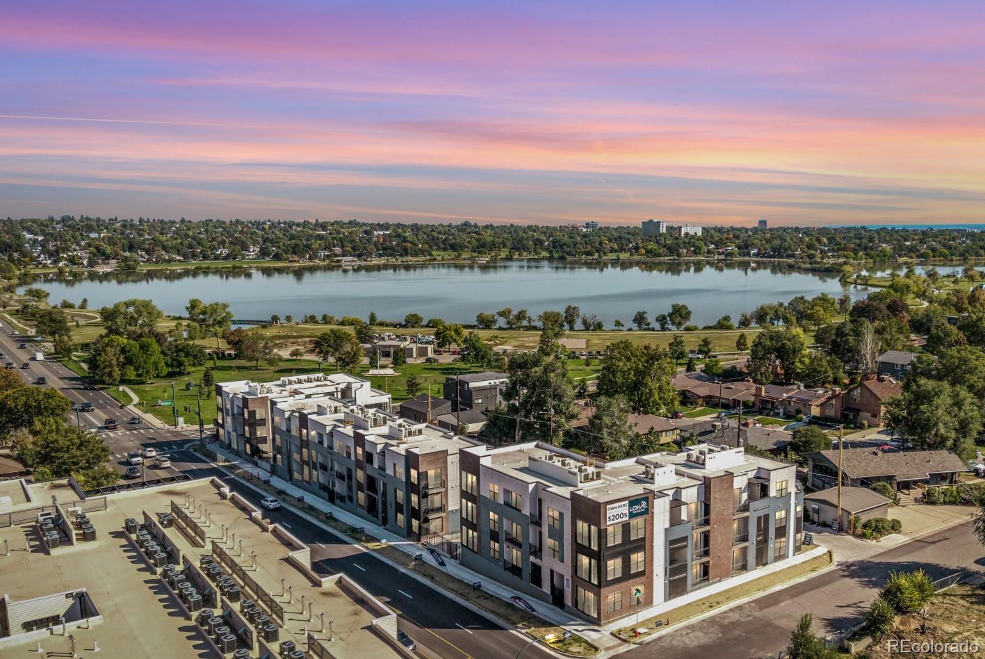 Move-in ready corner unit directly across from Sloan's Lake! This northwest-facing, ground-floor corner unit offers modern comfort with easy access to Denver’s best lakefront lifestyle.Introducing the Starla, a one-bedroom, one-bathroom urban flat with a bright, open-concept layout. The full kitchen features Samsung stainless steel appliances and Kohler® plumbing fixtures for a clean, modern feel. Oversized windows bring in natural light, and thoughtful storage is included throughout. Surface parking is available to add on. Enjoy life just steps from Sloan’s Lake Park, Edgewater Public Market, and a wide variety of shops, cafes, and restaurants. Whether you're walking the lake, grabbing a coffee, or heading downtown, the Starla puts you in the heart of it all.*Please note: Photos are shown of a different unit with the same floor plan. Interior color scheme and views vary, contact the Community Sales Manager for more details. Some photos contain virtual staging. All incentives applied to price.