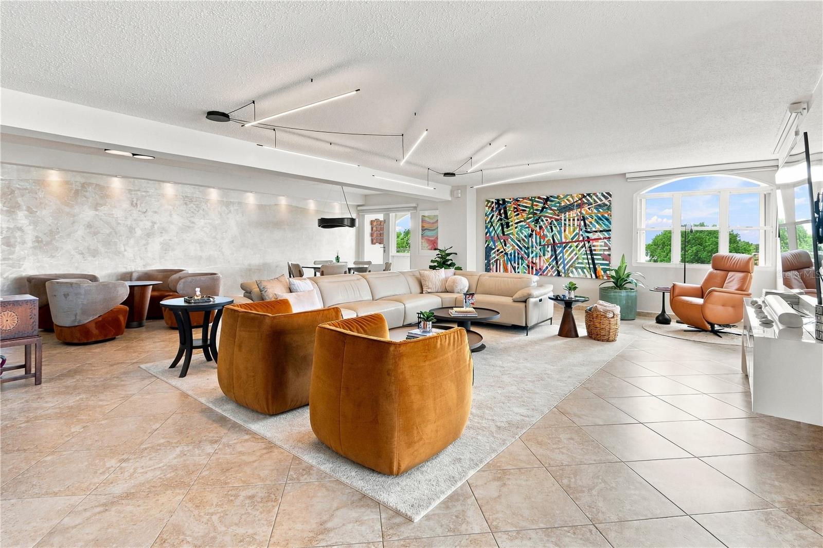 At over 2,500 square feet, this penthouse lives nothing like an apartment. Generous room proportions and a flowing layout give it the presence and ease of a private residence — without sacrificing the convenience of a well-positioned mid-rise building.The covered terrace is a defining feature: expansive enough for true outdoor living, sheltered for year-round enjoyment, and positioned so that on a clear day, the ocean appears on the distant horizon — a quiet, steady reminder of where you are.Inside, the residence has been thoughtfully curated throughout. Every bedroom is sized to breathe, and the primary suite includes a walk-in closet. A dedicated laundry room and storage areas woven throughout the floor plan mean everything has a place — daily life runs without friction.The unit sits on the building's gym floor, making the fitness center essentially an extension of the home. The building also offers a pool and gazebo for those moments that call for something slower.Three dedicated parking spaces and an address on Carretera #2 Caparra in Guaynabo complete the picture — minutes from major highway access, top-tier schools, established restaurants, and the area's most frequented shopping centers.For the buyer who wants volume, refined finishes, and a home that functions as well as it looks — PH 6 at Plaza Real Caparra is a rare find.HOA: $681.79CRIM: $1,870 each semester (without exoneration)