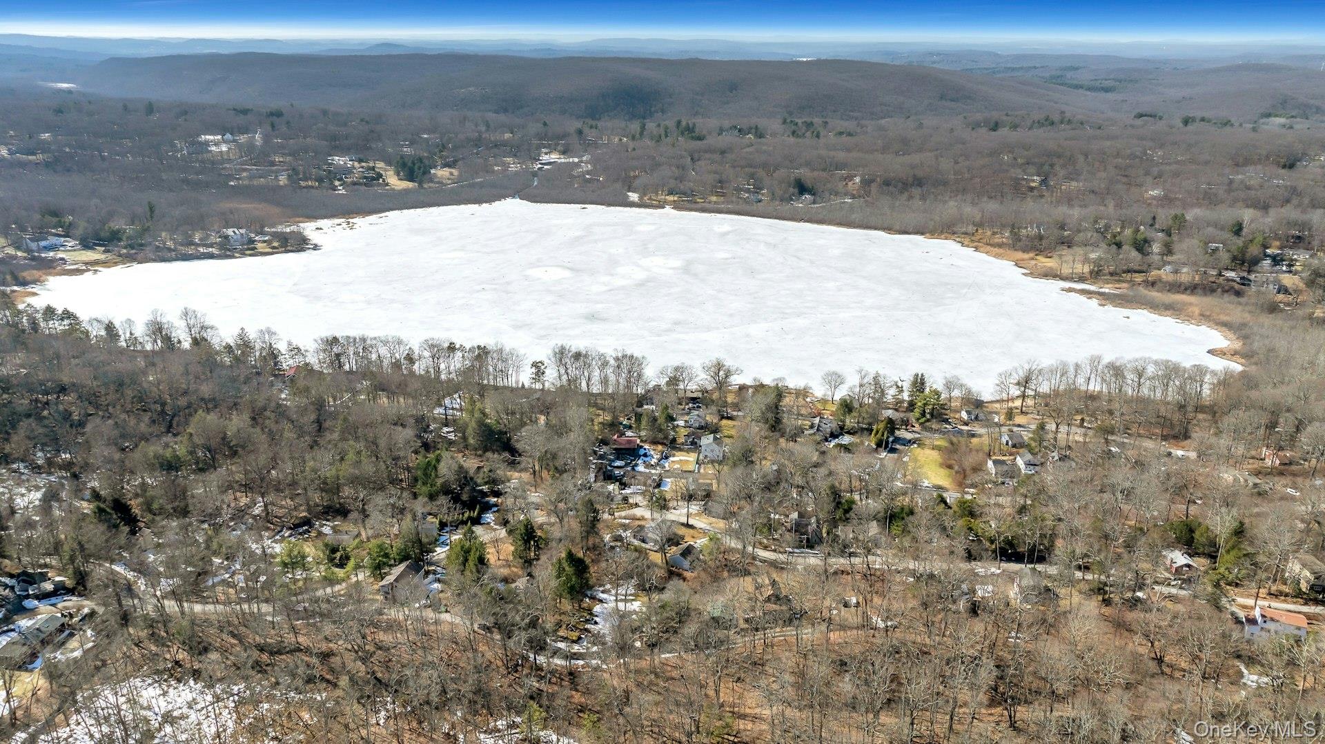 Calling all investors, builders, and contractors. 10 Beech Road presents a prime value-add opportunity on a quiet dead-end road in the desirable Lake Kitchawan community. This 3-bedroom home situated on approximately 0.43 acres is ready for renovation and ideal for cash buyers or purchasers using a rehab loan looking to create value. As a member of the Lake Kitchawan Association, owners enjoy beach access, lake privileges, and water access, including a private sandy beach and lakeside dock for non-motorized boating, kayaking, and paddleboarding. Conveniently located near Ridgefield, major commuter routes, and Metro-North, offering both investment upside and lifestyle appeal. Please note the oil gravity furnace is currently not functioning. The home does have supplemental electric heat that is operational. Cooking and hot water are fueled by propane (120-gallon rented tank). Property being sold strictly as-is.