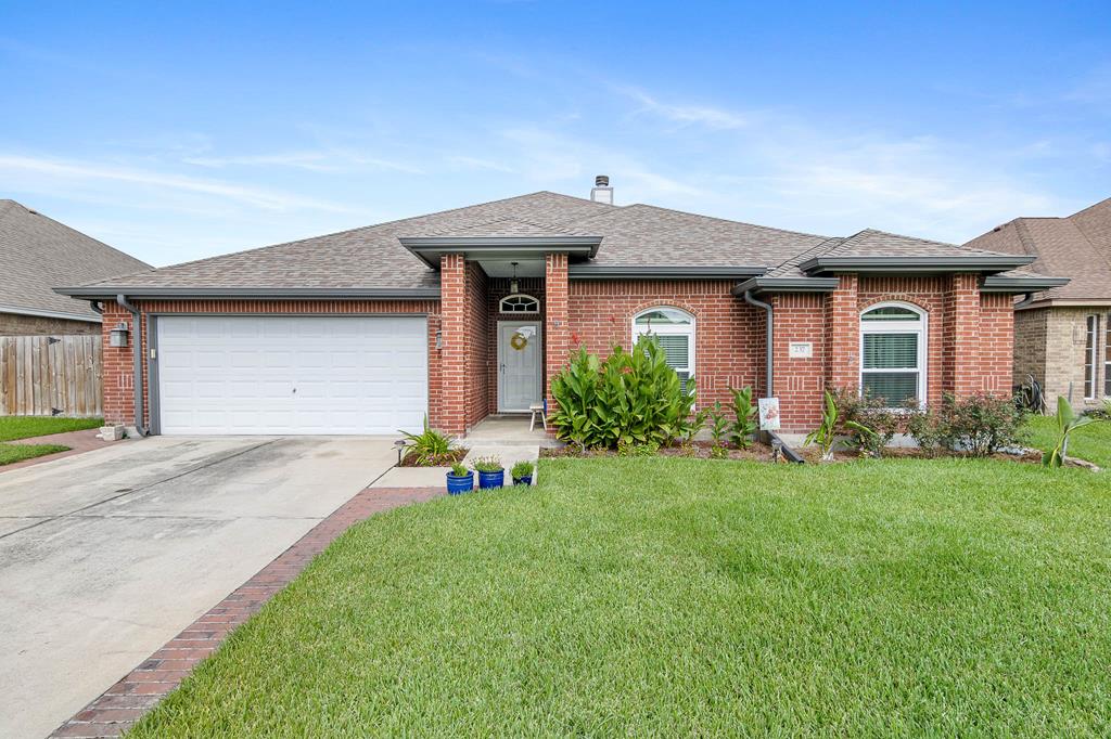 A handsome brick home that has been lovingly maintained with so many upgrades! Located in the coveted Legends of Northshore neighborhood close to EVERYTHING. This well situated home is completely remodeled with impact windows and immaculate interior. Pre-inspected for your convenience with unique architectural tiered ceilings, this four bedroom home boasts an additional room/workshop. Not on tax rolls! The lush lawn & flowerbeds greet you. A soft hue embraces you as you enter. A wood burning fireplace & lighted china cabinet grace the living room. One aspect the current owner enjoyed is the floorplan. Guest bedrooms share a very separate wing from the primary bedroom, evoking privacy. A large country kitchen with breakfast bar, lots of cabinets & counterspace have a view of the covered patio & large yard. The primary retreat boasts a separate tub & shower, walk in closet & double sink. The attic is partially floored for extra storage.