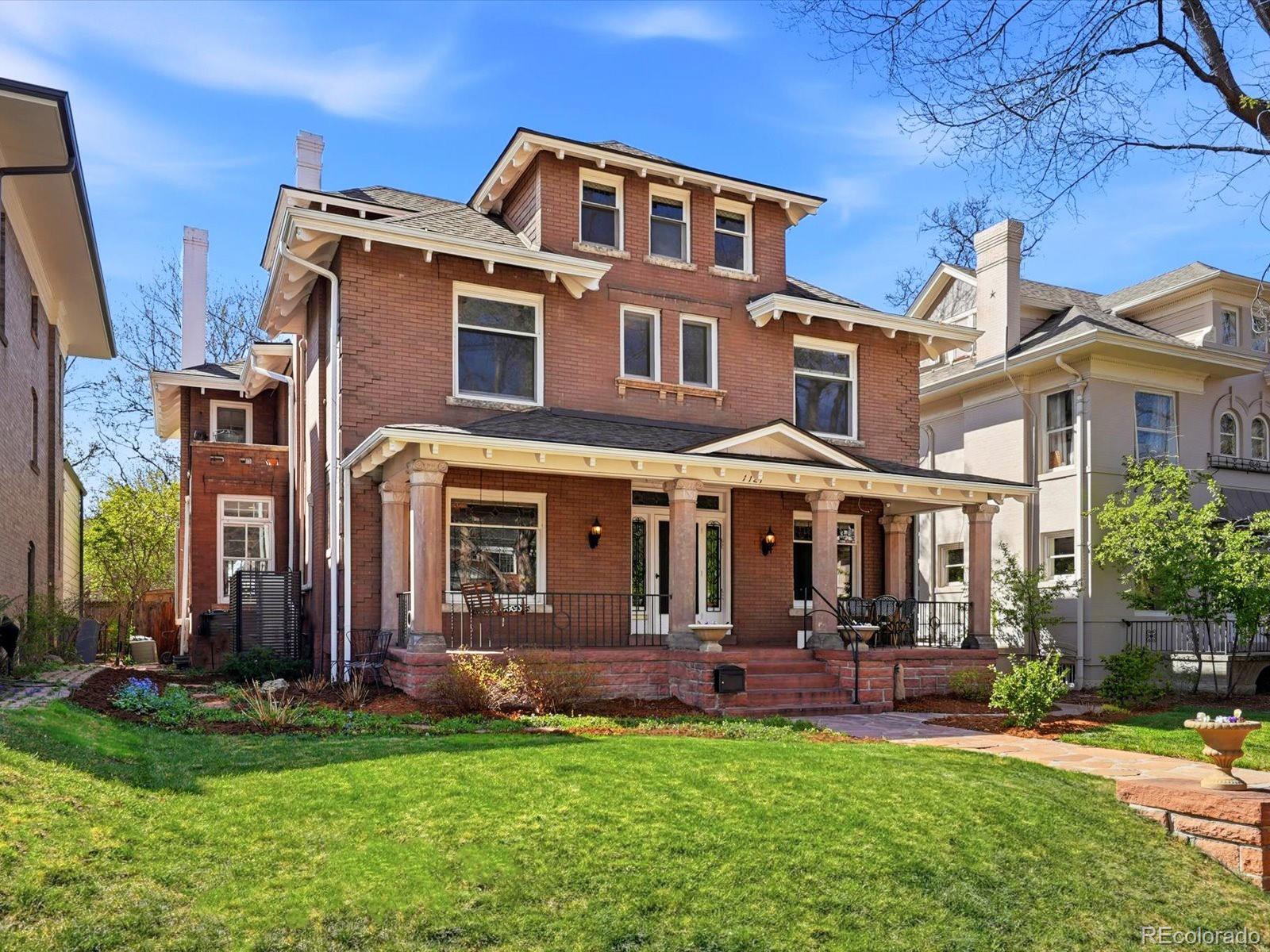 The perfect home for entertaining, this iconic 1899 residence blends timeless historic elegance with thoughtful modern updates in one of Denver’s most coveted settings. Located on Humboldt Island—one of only 26 homes in the Humboldt Street Historic District—this nearly 5,500 sq ft property showcases exquisite original craftsmanship, including stained glass windows, leaded glass, rich woodwork, and extensive built-ins throughout. This home has over $500,000 of updates since purchase. The main level welcomes with an inviting front porch ideal for gathering, and unfolds into gracious living spaces including a formal dining room with quarter-sawn paneling, box beam ceilings, and a stunning built-in sideboard. The living room features a sunroom alcove, oak mantle with marble backdrop, and original leaded windows. A formal parlor—perfect as a music room or office—adds versatility. The updated kitchen offers stainless steel appliances, a smart refrigerator, built-in microwave, and extends into a coffee bar with prep sink. A mudroom with built-ins provides a functional drop zone. The newer hardwood floors have french knots, preserving the historic features. Upstairs, the second level hosts a spacious primary suite with double closets, private balcony, and an updated bath with wainscoting and oversized shower. Four additional bedrooms include an east-facing suite with sitting parlor, plus a charming original bath with clawfoot tub. The third floor offers three more bedrooms and a bath—ideal for guests, nanny quarters, or creative spaces.The basement features a media room, a gorgeous temperature controlled wine cellar, full laundry room and abundant storage.Outside, enjoy a fenced and gated entertainer's dream backyard with a large patio, hot tub, fire pit, and gas grill, along with a 2-car garage. Just steps from Cheesman Park and central to Denver’s best amenities, this rare historic gem offers unmatched character, space, and livability.