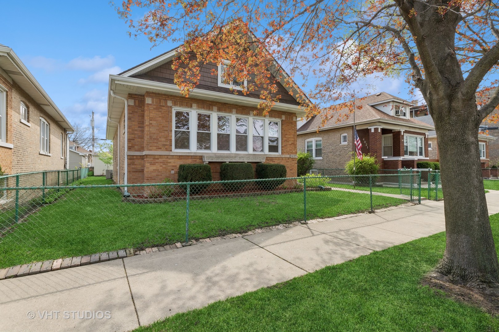 Stunning Oversized Historic Brick Bungalow on a Rare Double Lot! Experience the perfect blend of historic charm and modern convenience in this authentic 6-bedroom, 3-bathroom home, proudly recognized by the Chicago Brick Bungalow Society. Being sold for the first time in over 50 years, this property is rich in character, showcasing beautifully preserved doors, intricate moldings, hardwood floors, and exquisite stained glass windows. The thoughtfully updated kitchen, complete with a large walk-in pantry, and modernized baths offer contemporary comfort while honoring the home's vintage appeal. Designed for style and functionality, the layout includes three spacious bedrooms on the main floor, two on the second level-including a private master suite-and one in the fully finished  basement. Additional highlights include a dedicated office space, generous closet space, and abundant storage throughout. Outside, the fully fenced and meticulously landscaped double lot offers endless possibilities-ideal for outdoor entertaining, future expansion, or investment opportunities. Don't miss this rare opportunity to  own a historic gem with modern updates, rich history, and an unbeatable location!