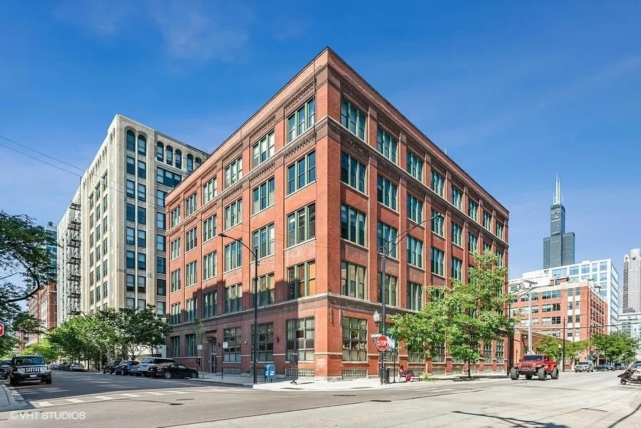 Available April 1. Beautifully remodeled 1bd/1.1ba 900sqft timber loft in West Loop! The unit features 13+ ft. ceilings, expansive windows & exposed brick. Maple cabinets, white quartz countertops, high end stainless steel appliances, (Bosch, Samsung LG) glass subway tile backsplash and new LG front load stacked washer and dryer in unit. Fully enclosed bedroom includes an ensuite bathroom with Carrara marble counter and tile and ample closet storage in loft area for storage. Remodeled powder room off the living room area. Convenient common area balcony & deck with professionally landscaped courtyard. Steps from, Halsted & Randolph Dining, one block from Blue Line & close to major Expressways. Cable & internet are included in monthly rent. Rental parking available next door.  Tenant Requirements: 700+ Credit Score, Income 3X's the rent.