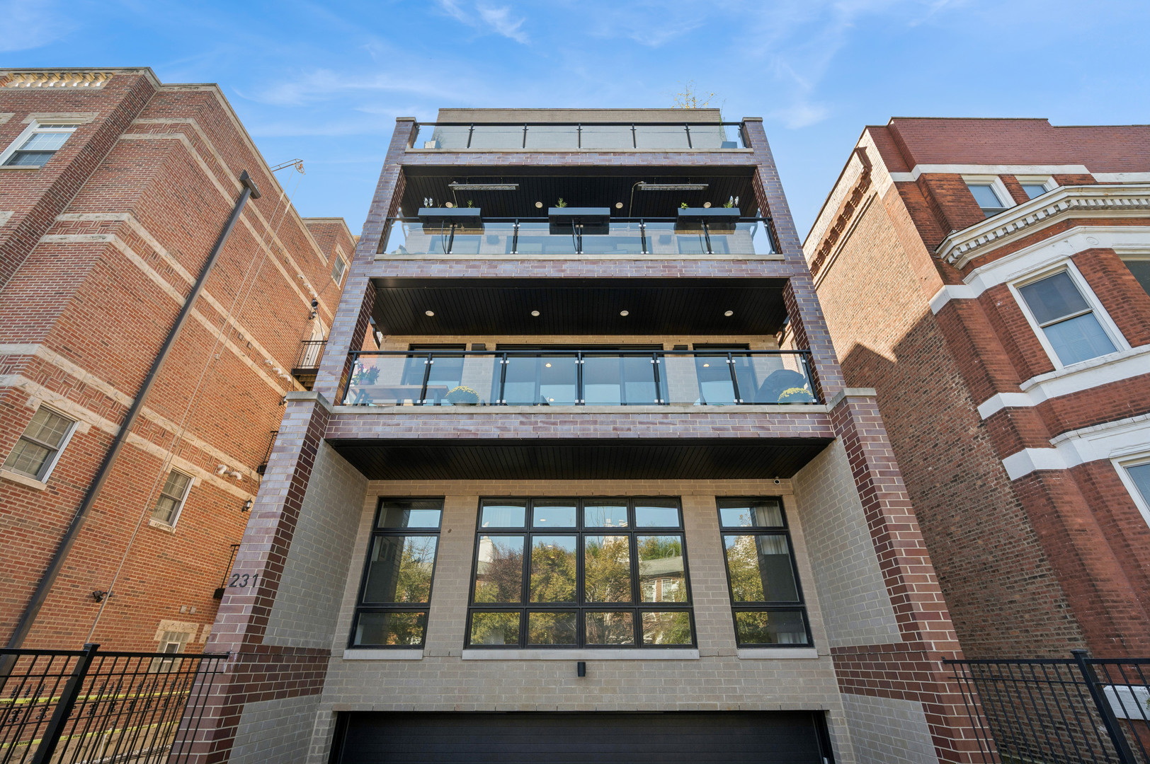 Welcome to 231 W. Scott Street, Unit 2, a beautiful, newer construction, all-brick, custom-built home nestled within Old Town-Gold Coast's premier residential cul-de-sac. Completed in 2019, the elegant, extra-wide 3bedroom/2bathroom floor plan offers 2,000 square feet of luxury design and exquisite finishes. An expansive 26-foot north-facing terrace frames stunning treetop and cityscape views that enhance the open-concept living, dining, kitchen, and great room, filling the home with brilliant natural light. The dining room is complemented by a dry bar with dedicated wine and beverage stations. An impressive linear fireplace adds architectural depth, ambiance, and warmth to the living space. The highly appointed chef's kitchen features a complete Gaggenau appliance package with a Sub-Zero refrigerator and a 12-foot white quartz peninsula illuminated by RH cloche pendant lighting. The luxe primary suite is a haven of tranquility featuring a spa-quality steam shower, radiant heat floors, dual vanity, and a private water closet. Bedroom two doubles as a spacious home office with modern tilt-and-turn French doors opening to an additional side balcony and a convenient pet amenity. The generous third bedroom serves as a home gym with a custom-built king-sized Murphy bed for maximum versatility. A separate laundry room with a full-size washer and dryer completes the private quarters. Wide-plank oak flooring runs throughout, and every closet has been custom-designed. A designated heated, attached garage space plus bike storage is included with the unit and offers a heated, snow-free driveway and sidewalk. This dynamic, highly walkable Old Town neighborhood blends historic architecture with modern urban energy. Residents enjoy easy access to both the Red and Brown Lines, the Lakefront Trail, Lincoln Park, Oak Street Beach, the Magnificent Mile, Chicago's celebrated "Second City" entertainment district, four grocery stores are walking distance, and an endless selection of shopping and dining. This is a rare opportunity to own a blue-chip stock in Old Town. Make your showing request for your new home today.
