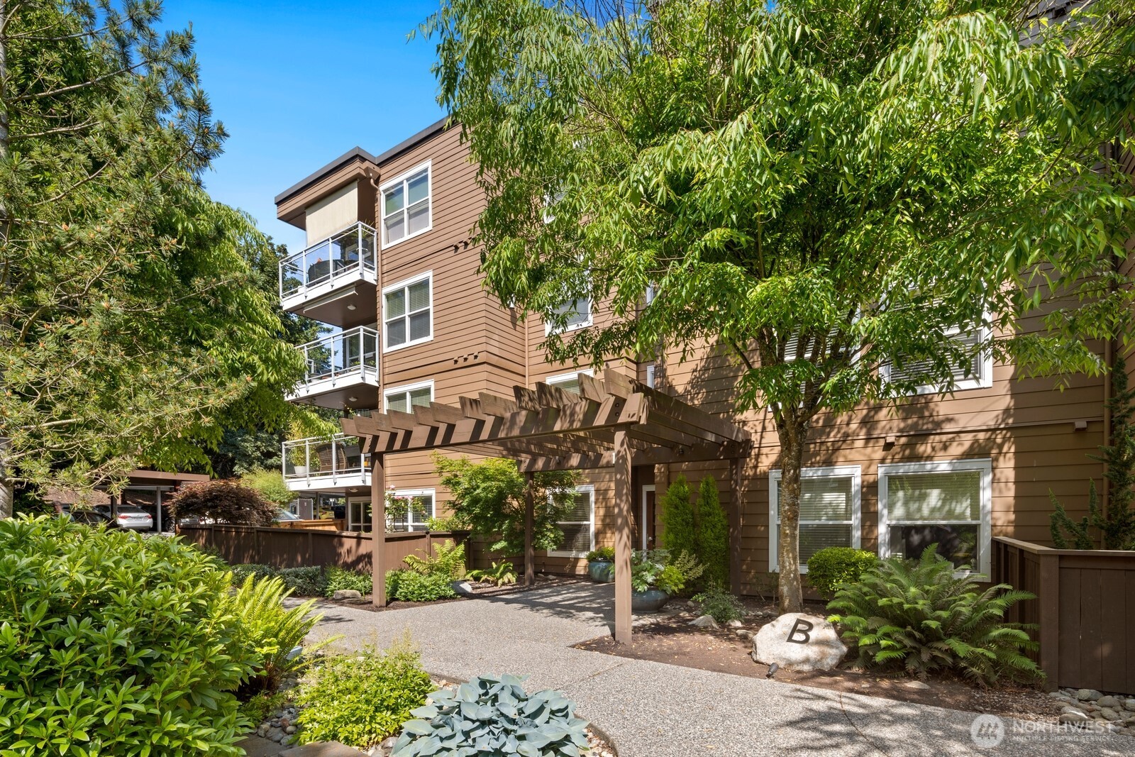 Resort-style living at Sequoyah Condos! This beautiful 1 bed, 1 bath home offers a bright, open layout with granite counters, stainless appliances, in-unit washer/dryer, new carpet, and fresh paint. Enjoy added privacy—lives like an end unit with no direct neighbor beside the bedroom. Ideally located near the elevator, with a dedicated parking space just outside the building entrance for easy access. Soak in the serene setting with lush landscaped grounds, sparkling pool, fitness room, clubhouse, and elevator. Minutes to I-5, Hwy 99, and Downtown Edmonds shops, restaurants, and waterfront. Welcome Home!