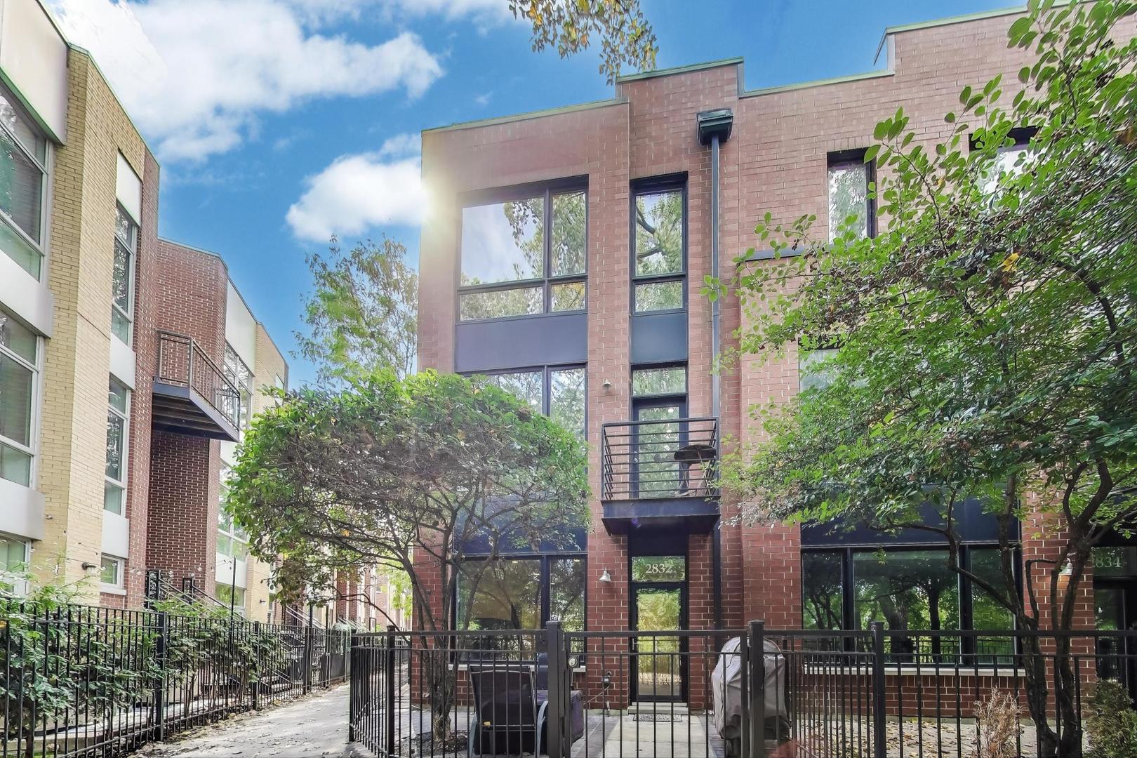 Largest 4 bedroom unit in the complex with 3000+Sq Ft of highly upgraded living spaces. This quiet, sunny waterfront corner home features an attached 2-car garage with storage, 5 outdoor spaces, including a private front and side yard. Awesome kitchen with stainless steel appliances, cherry cabinets, granite counters & island, opening to a  29 X 18 living area overlooking the water, 2 decks, hardwood floors, a cozy fireplace. Tall ceilings, crown moldings. A huge and bright primary suite overlooking the Chicago river, a spa-like primary bath with heated floors and a wonderful soaking tub, and a large closet. 3 additional bedrooms on the top floor, an office on the primary suite level as well as flexible family room or an entertainment space with a separate bathroom on the ground level with direct access to the garage and a front yard. Zoned HVAC and so much more!
