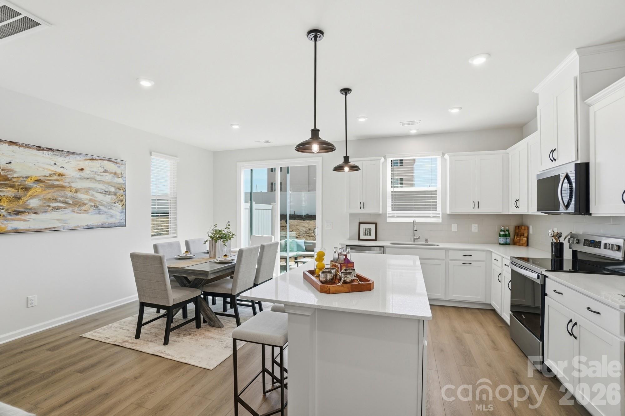Location, Location, Location and incredible incentives!Stunning Briana plan, where space, light, and luxury come together in perfect harmony. Always built as a coveted end unit, this stunning townhome is bathed in natural light from extra windows, creating an airy, elevated feel from the moment you step inside.With 3 spacious bedrooms, 2.5 designer-inspired baths, and 1,744 square feet of beautifully curated living space, the Briana offers the comfort of a single-family home with the ease and convenience of low-maintenance townhome living. The expansive open-concept main level is ideal for entertaining or unwinding in style, while the upstairs loft creates the perfect flex space for a home office, media lounge, or private retreat.A rare 2-car garage, enhanced curb appeal, and thoughtful design throughout make this home feel truly premium — the kind of space that instantly feels like a lifestyle upgrade.Located in The Townes at Cheyney, one of North Charlotte’s most desirable new communities, you’ll enjoy resort-style amenities, professionally maintained landscaping, and a connected, lock-and-leave lifestyle — all just minutes from Uptown Charlotte, Charlotte Douglas International Airport, and the best shopping and dining in Huntersville.With quick access to I-485, I-77, and I-85, everything you love about Charlotte is right outside your door.This is more than a home.It’s where everyday living feels like a getaway.
