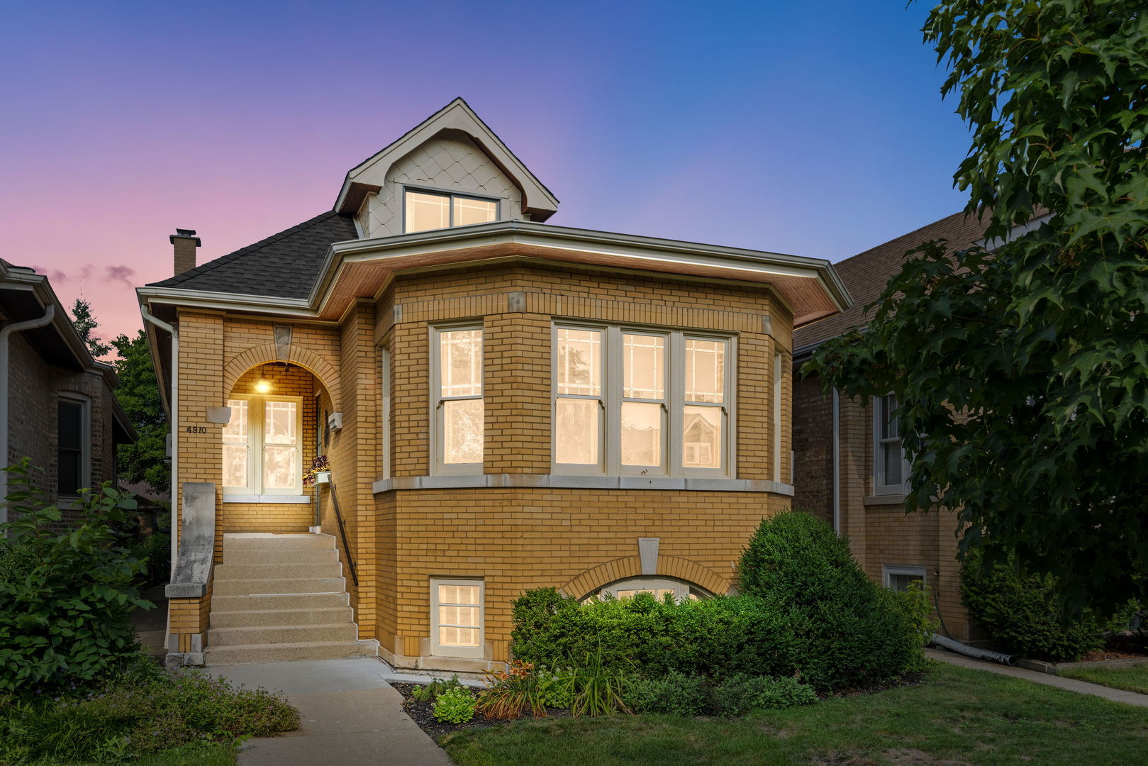 Vintage charm meets modern comfort in this oversized Mayfair brick bungalow! Featuring 3 bedrooms, 2 full baths, and a serene backyard oasis with a one-car garage, this home offers timeless appeal with today's most desirable updates. The 2025 renovated chef's kitchen shines with quartz counters, a 5-burner range, pot filler, undercounter RO water filter, double-door wine and beverage fridge, plus new Jeld-Wen windows and a Mastercraft door.    Additional upgrades include a high-efficiency hybrid electric water heater, fully paid solar panels, a new electrical panel with extensive re-wiring, and 3 mini-split heat pump units providing efficient A/C and heat in multiple rooms. A freshly renovated laundry room adds even more convenience and style. Enjoy peace of mind with a hardwired camera system and hardwired video doorbell.    The partially finished basement is ready for your ideas-whether that's a home office, gym, or family lounge. And with a location just blocks from Palmer Elementary, the Mayfair Branch Library, Gompers Park, the Montrose Blue Line, and easy expressway access, you'll love both the home and the neighborhood.