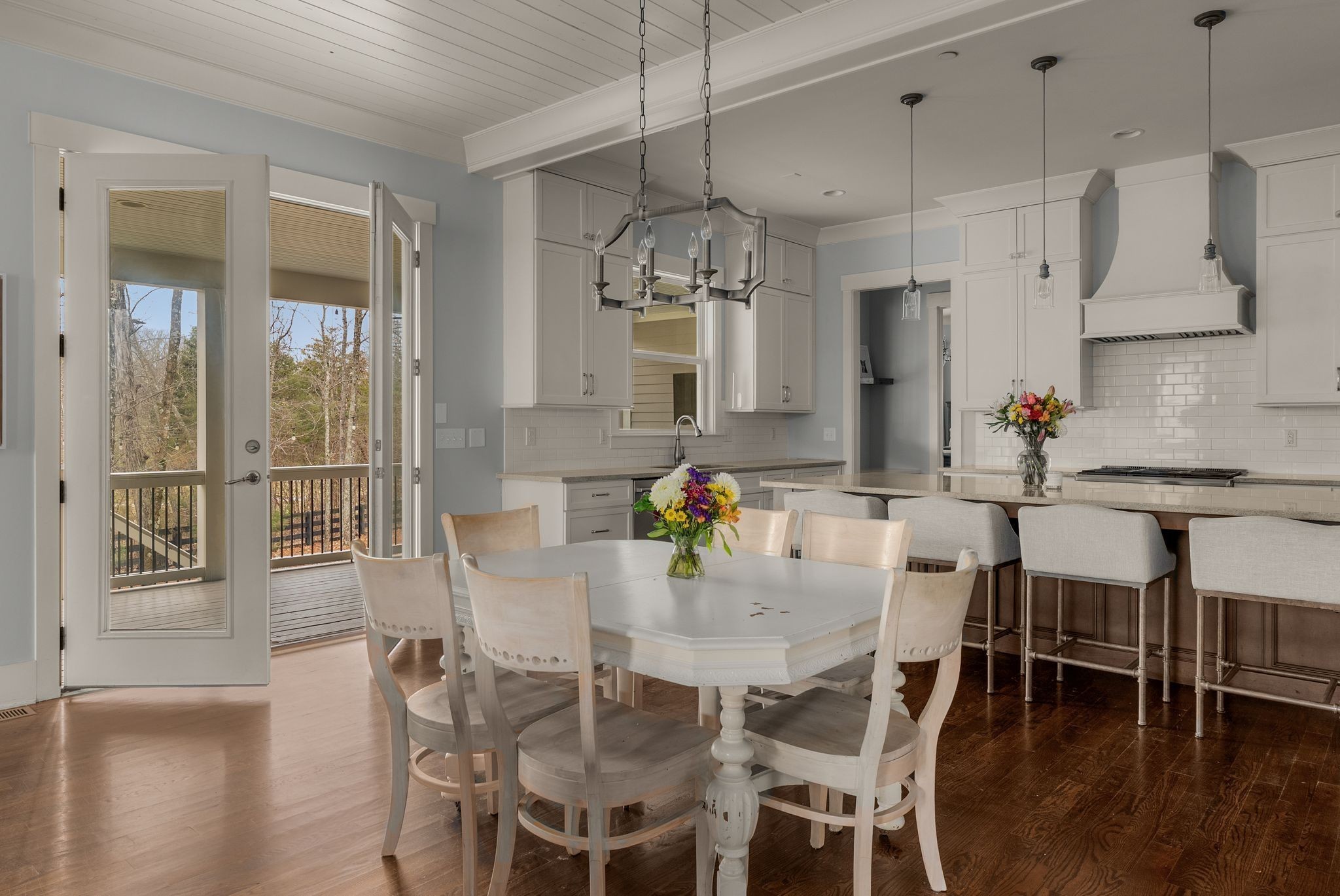 There are certain neighborhoods people wait years to get into, and this is one of them. Tucked within an exclusive six-home enclave on just over an acre, this modern farmhouse offers the kind of privacy, space, and sense of community that's becoming increasingly hard to find. Located in Nolensville with easy access to Brentwood and zoned for award-winning Williamson County schools, it's a place where families put down roots and stay awhile.From the moment you step onto the front porch, the home feels welcoming. Inside, soaring ceilings, oversized doors, and a striking double-sided fireplace create a space that feels open yet inviting. Every room was thoughtfully designed, balancing everyday comfort with effortless entertaining.Need a quiet place to work? There are two dedicated home offices. Looking to skip the gym? There's one waiting in the garage. Whether it's a slow Tuesday dinner or a house full of family and friends, the kitchen was designed to handle both with ease. Thoughtful upgrades, including a whole-home water filtration system, are woven throughout and reflect the level of care that went into every decision.Out back, the story continues. A spacious, fenced backyard surrounded by mature trees offers the kind of privacy that's hard to come by, with plenty of room to host friends, let the kids play, or simply enjoy a quiet evening under the trees.Homes in this enclave rarely become available, and once you experience the setting, it's easy to understand why. Move-in ready, thoughtfully designed, and set in one of Williamson County's most sought-after locations, this is the kind of home people hope comes along—and one they'll be proud to call their own.