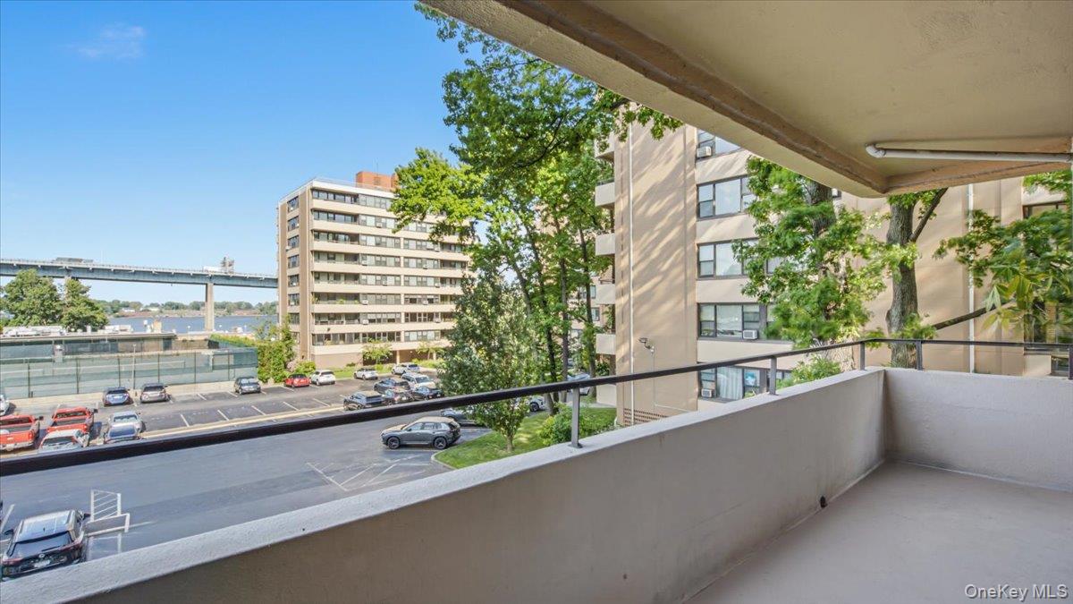 Experience unparalleled waterfront living in this stunning two-bedroom residence in the sought-after Le Havre community in Beechhurst. This home offers breathtaking, direct views of the water and the iconic Throgs Neck Bridge, which you can enjoy from the spacious living area, your private terrace, or the comfort of your primary bedroom. The interior has been meticulously upgraded, featuring smooth ceilings accented with modern hi-hat lighting throughout. Elegant, light-toned flooring flows throughout the unit, enhancing the bright, airy atmosphere. The kitchen is a chef's delight, equipped with premium stainless steel appliances, including a dishwasher, and finished with sleek cabinetry and stylish countertops. The beautifully updated bathroom showcases crisp, modern tile work and high-quality fixtures. Additionally, this unit includes an assigned parking spot, available with a transfer fee payable to the co-op. Residents of Le Havre enjoy many amenities, including two outdoor pools, tennis courts, a fitness center, a clubhouse and cafe, multiple playgrounds, beautiful landscaping, and 24-hour security. The lifestyle here is as practical as it is picturesque, with the local bus Q15 to Flushing and the QM2 Express Bus to Manhattan, as well as schools, restaurants, and shopping.