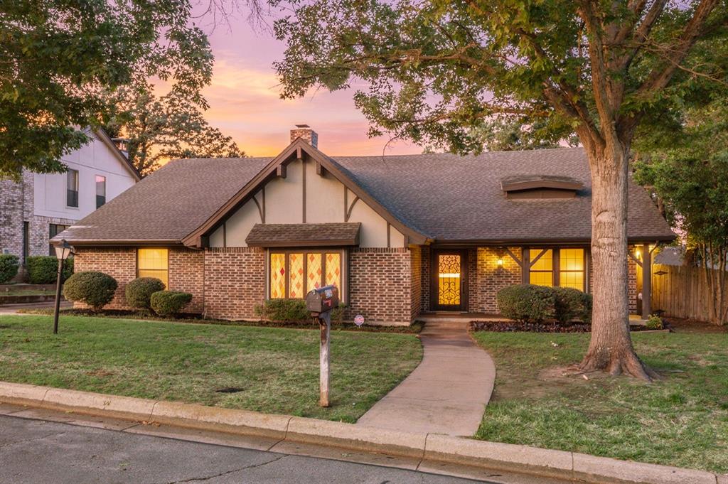 OPEN SAT, MAY 9TH 1-3PM!  Designed for the way you truly live, this beautifully updated 4-bedroom, 2.5-bath home offers the perfect blend of comfort, flexibility, and convenience. The inviting main living area serves as the heart of the home, featuring a cozy fireplace framed by custom built-in cabinetry for both style and storage. The updated kitchen is thoughtfully designed with custom cabinetry, quartz countertops, an eat-in breakfast bar, new range, and a spacious breakfast room filled with natural light from oversized windows overlooking the backyard. Whether enjoying a quiet morning coffee or hosting weekend gatherings, this space feels warm and welcoming. The relaxing primary suite offers a sitting area, and ensuite with two private prep areas and vanities, along with fine finishes found in much more expensive homes, including Carrera marble, granite, an updated deep soaker tub and luxurious shower - all designed for unwinding after a long day. Updates don't end there, but can be found in each bathroom, as well as a neutral palette throughout the home,  With four generously sized bedrooms, and a versatile floor plan that provides a flex space perfect for a second living area, formal dining room, playroom, or home office, there’s room for guests, work-from-home needs, or multi-generational living. Step outside to a large patio ideal for outdoor dining, grilling, and entertaining, while the rear-entry garage adds both privacy and curb appeal. The Texas sized garage offers plenty of room for large cars, workbenches, outdoor tools and much more! Ideally located within walking distance to the local elementary school and conveniently situated between Dallas and Fort Worth, this home places you minutes from Texas Live!, AT&T Stadium, Globe Life Field, Six Flags, and Texas Rangers Golf Club. Enjoy quick access to dining, entertainment, and year-round attractions while still coming home to your own private retreat.  See it TODAY or see it SOLD!