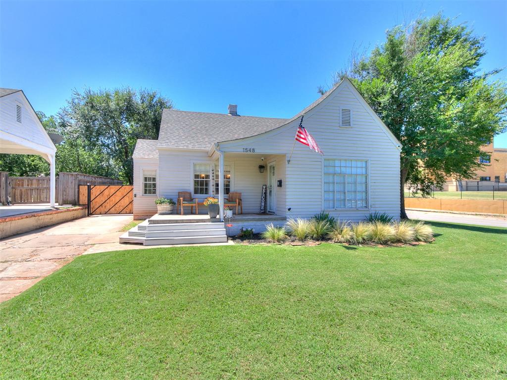 Nestled at 1548 NW 37th ST, Oklahoma City, in the Putnam Heights addition , is this single-family residence which offers a unique opportunity to reimagine a piece of history. Built in 1939, this property holds immense character. The residence includes two spacious bedrooms, providing comfortable spaces for rest and rejuvenation.  The home has one remodeled updated bathroom with glass enclosure, tile surround and floor as well as spacious,  double sinks with extended countertops and edison lighting.  This 1939 single-family residence offers hardwood floors throughout, a large living room with faux fireplace accent with an antique Humphreys natural gas radiant heater , lots of natural light, and a great flow. Currently there is also a study as this seller is using or could be a dining space, or extra living flex room.  Inside the kitchen you find lots of cabinets that even new homes dont offer, upgraded counter tops, a dishwasher, gas stove and an eat in space.  Plus this home offers in home washer/dryer.  Come walk the darling front entry porch to this home that is a must see for the buyer who wants old warm charm and character with a touch of today, see all it offers and then experience the back yard, spacious, with raised planters, recently sodded, new cedar fence with steel posts, and a perfect shaded spot for your entertaining delight.

This seller has done lots of upgrades since purchase from new fence, new electronic gate to the driveway, parking area and patio. A large shed is on property that is negotiable with strong offer. Blinds installed, electrical overhaul in 2024, new electrical 200 amp service, recessed lighting,