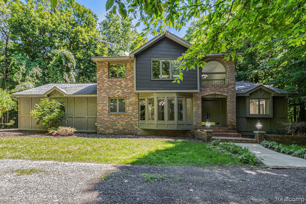 Tucked away on a private 13-acre wooded setting, this beautifully renovated custom-built two-story home offers the perfect blend of seclusion, space, and modern style. With over 3,300 square feet of living space, 4 bedrooms, and 3 full bathrooms, this home is ideal for those seeking comfort, functionality, and privacy.
Step inside to discover a bright, open floor plan featuring soaring vaulted ceilings, a dramatic catwalk overlooking the main living area, and a large open-concept kitchen, dining, and living space. The kitchen has been fully updated with stainless steel appliances, brand-new cabinets, and elegant marble countertops—designed for entertaining and everyday living.
Relax by the cozy wood-burning fireplace in the living room or retreat to the spacious main-floor primary suite. The main level also includes a large laundry room for added convenience. Upstairs, additional bedrooms and a full bathroom provide flexible space for family or guests.
Outside, enjoy a fenced segment of the backyard perfect for pets or recreation, and take advantage of the oversized attached 3-car garage with plenty of space for vehicles, tools, and toys. The expansive acreage surrounding the home offers unmatched peace, privacy, and room to roam.
This is the retreat you’ve been waiting for—call today to schedule your private showing!