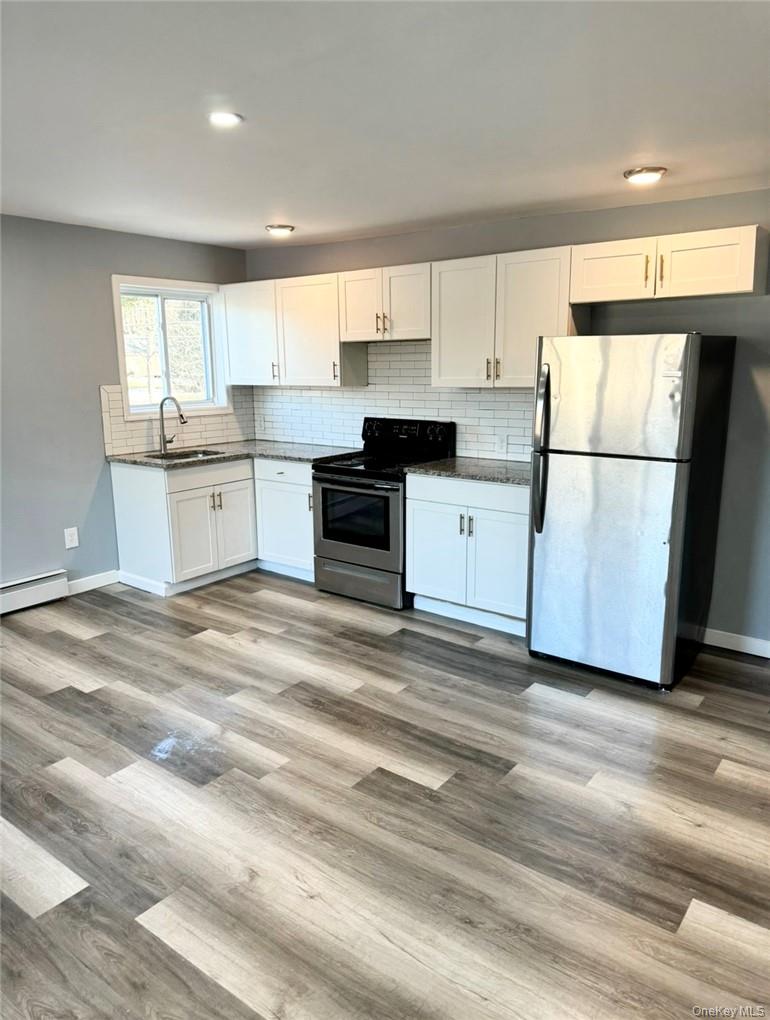 Fully renovated 2 bedroom apartment for rent in Swan lake  Section of Liberty. New Kitchen with granite counter tops, New appliances, New windows and doors, New Luxury Plank Flooring. This unit features, 2 Bedroom, 1 Bath, Open concept living room dinning room, recessed lighting... Heat and water is included, Tenant pays electric. Private parking Available. Laundry room available in the building. Conveniently located in Swan Lake. Minutes away from shopping, restaurants and stores. Rental Application, MUST HAVE 660+ Credit, 40X Rent Combined Income. 15-20 Minutes to Kartrite Waterpark and Resorts World Casino, to Bethel Woods for the Performing Arts. Additional