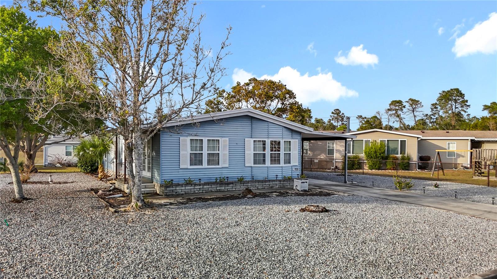 BRAND NEW ROOF TO BE INSTALLED PRIOR TO CLOSING. Welcome to this super cute 2-bedroom, 2-bath home nestled in the highly desirable 55+ Brookridge community. From the moment you arrive, you'll appreciate the lovely front yard featuring attractive rockscaping, offering beautiful curb appeal with zero lawn maintenance required. Step inside and discover a spacious open floor plan that seamlessly connects the living, dining, family room and kitchen areas, perfect for entertaining guests or enjoying quiet evenings at home.  The eat-in kitchen offers newer counters, lots of cabinets, providing ample space for all your cooking needs. The master bedroom offers a spacious walk-in closet, providing ample storage. The connected master bath features dual sinks for convenience, a relaxing bathtub, and a separate shower. The second bedroom also features a generous walk-in closet, ensuring plenty of storage space for occupants or guests. Adjacent to the bedroom is the second full bathroom, providing privacy and comfort. This property boasts a huge storage room, ideal for keeping seasonal items, hobbies, or extra belongings organized. The room includes a washer and dryer for laundry convenience, as well as an additional storage area to meet all your household needs. Recent updates and features include newer AC, new water heater, updated wiring, updated windows. The generous layout provides plenty of natural light and a warm, inviting ambiance throughout. Brookridge offers an array of amenities, including a heated pool, tennis & pickleball courts, golf course, horseshoes, bocce, pickleball, a community center, and much more. Best of all, you own your land, and HOA fees remain low, maximizing value and enjoyment. Just minutes from the famous Weeki Wachee live mermaids, Pine Island Park, and Roger’s Park for endless fun on the water. Close to shopping, dining, major medical facilities, and the Suncoast Parkway for easy commutes to the airport, Tampa, Clearwater, St. Pete Beaches (ranked among the top five U.S. beaches), and the renowned Tarpon Springs Sponge Docks.