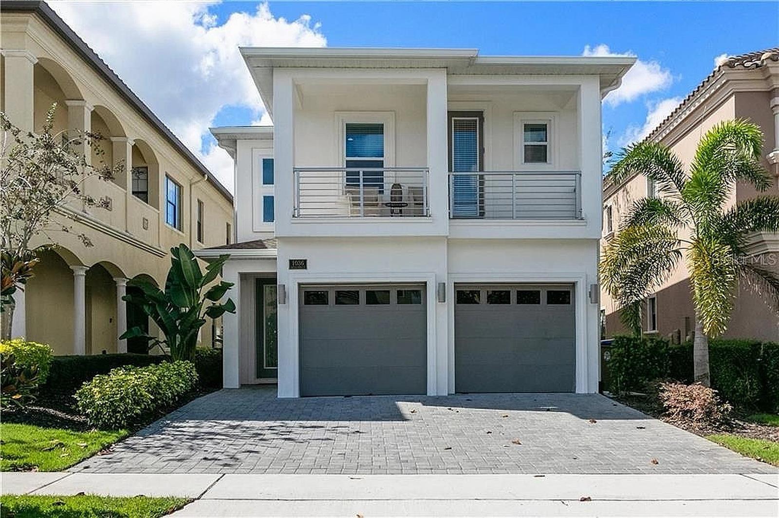 Offered with an **Active Reunion Membership**

Reunion Resort—front-row golf views, fully furnished, and made for memory-making. This home comes with a coveted, active Reunion Membership! Welcome to 1036 Castle Pines Ct, a 2017 custom-built contemporary overlooking the fairway and green of the 6th hole on the Jack Nicklaus Tradition Course. With 6 bedrooms, 5.5 baths, and 3,228 sq ft on a 4,879 sq ft lot, this single-family home blends clean modern design with resort comfort—and it’s sold fully furnished.

Step inside to a sun-splashed, open-plan living/dining/kitchen perfect for entertaining. The chef’s kitchen features gas cooking, top-tier stainless appliances, an oversized refrigerator, and a built-in ice maker. The first floor is fully tiled and includes a private primary suite; upstairs, hardwood floors carry through two additional primary suites with a covered balcony (front and rear). Outdoors, enjoy a west-facing pool & spa, outdoor kitchen, extended paver patio, and motorized screen enclosure—ideal for golden-hour views over the Nicklaus course.
Inside the fun continues with a home theatre (garage conversion) boasting 8 seats and a 140" screen with projector and surround sound. 

With receent paint and decoration upgrades in common areas downstairs and the addition of themed bedrooms and games loft, the property is in execellent condoition - no need to spend money.

The upper loft adds a casual hangout space with air hockey, a Pac-Man arcade, mini-fridge, and a large Smart TV/PS4. Every bedroom includes a large Smart TV (patio, too). Sleeping for up to 12 guests. 3 king suites, 2 full/full bunk rooms, and 1 queen.

Set within Reunion’s Fairway Ridge on the West Side, you’re minutes from Reunion Grande, 6 miles to Walt Disney World, and a short drive to Orlando International Airport. 

Reunion’s 2,300-acre private golf & tennis community offers infinity pools, a full-service spa, fitness, dining, trails, kids’ activities, and more.

Cherished by its current owners for unforgettable gatherings, this home is ready for its next chapter—your private Florida getaway or an income-producing short-term rental. We love working with Realtors—come tour, feel the view, and see why this one stands out.