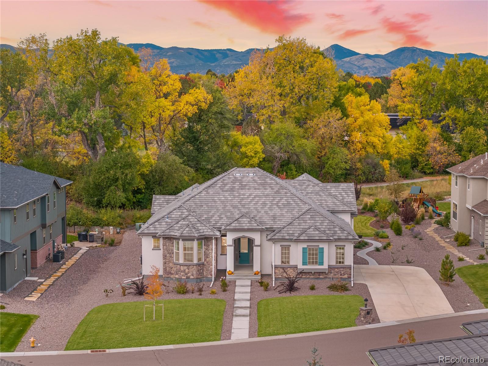 Welcome to The Hermes of Wild Plum!

-Voted one of the Front Range’s most desirable communities. This 2023 curated estate celebrates Colorado living with panoramic windows, expansive sliders, and seamless indoor-outdoor flow connecting you to scenic Cooley Lake, walking paths, and Columbine Country Club.

-Inside, discover a flexible, popular designer floor plan that transitions effortlessly between formal elegance and relaxed comfort, with soaring ceilings, natural textures, and curated finishes throughout.

-The chef’s kitchen is the heart of the home set beneath a dramatic cathedral ceiling with full-slab Calacatta Arno quartz, a massive island, and elite professional-grade appliances, including a Viking 6-burner range, JennAir direct vent, panelized Thermador columns, Sub-Zero wine fridge, double JennAir wall ovens with convection, and two (2) JennAir dishwashers. Ideal for formal events or casual gatherings, the kitchen flows to the living room with coffered ceilings and Napoleon linear fireplace, or to the covered patio for year-round entertaining.

-Retreat to a luxurious primary suite with NuStone Crystal Quartz finishes, freestanding tub, and frameless glass spa shower. The finished lower level adds a wine and tasting room, wet bar, gym, rec space, home theater and too much else to list here. 

-Smart and efficient, this home features fiber-optic connectivity, Cat6 access points, security system, automated shades, dual (2) tankless water heaters, Honeywell smart thermostats, and a 320-amp electrical system and a three-car EV-ready garage. This modern smart home masterpiece defines Wild Plum luxury.

Schedule your private showing today!