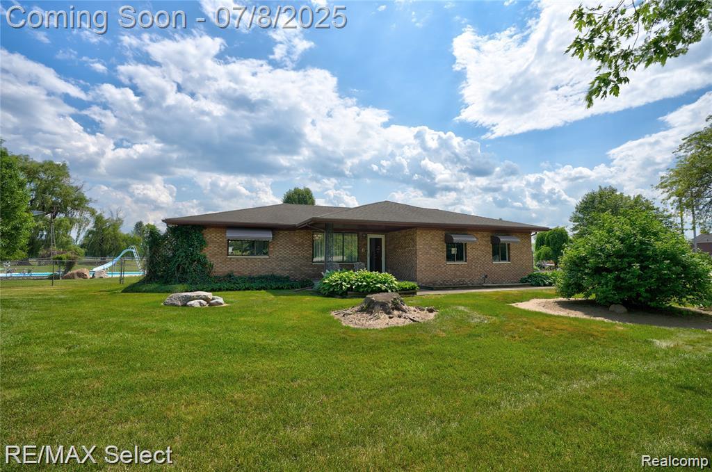 Welcome to your own private retreat! This 3 bedroom, 2 bath brick ranch is nestled on more than 27.6 scenic acres featuring two serene ponds, a fenced in-ground pool with pool house, multiple pole barns and outbuildings, and a spacious covered deck—perfect for relaxing or entertaining. Inside, you'll find an inviting eat-in kitchen with oak cabinetry and ceramic tile floors, a cozy firelit family room, and a convenient laundry room with ample storage and stainless steel washer and dryer. The primary bedroom offers warm wood flooring and a private bath. The lower level is ready for your finishing touches to add additional living space or recreation areas. Updated with fresh paint and stylish new flooring throughout in 2020. Don't miss the opportunity to own this one-of-a-kind property with endless possibilities for hobby farming, recreation, or simply enjoying peaceful country living!