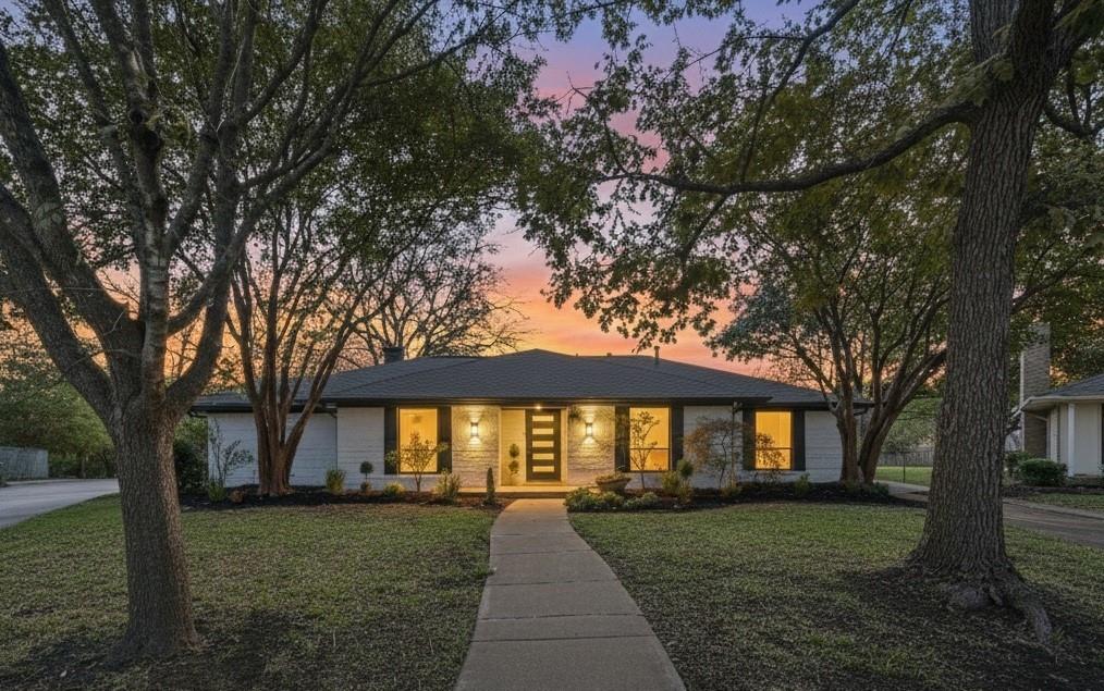 Do not miss this one! Fully remodeled from top to bottom, featuring a stunning new kitchen, 5-beds + office, 4.5 designer baths, 0.3 acre with breathtaking forest views, and more! Welcome to 2708 Lark Cir - ideally located on a quiet cul-de-sac street in the sought-after Park Blvd Estates. Thoughtfully redesigned with modern finishes and premium materials, this 2,667 SF residence seamlessly blends style, functionality, and comfort. Step inside to an open-concept layout filled with abundant natural light from numerous windows. The living area features vault ceiling with exposed beams, a beautiful gas fireplace, and a natural flow into the dining and kitchen spaces. The gourmet kitchen is a showstopper, offering white shaker cabinetry, quartz countertops, an eat-in island, designer lighting and all-new stainless-steel appliances. The spacious primary suite includes two closets and a luxurious ensuite bathroom with a standalone soaking tub and a rainfall shower surrounded by floor-to-ceiling tile. Two additional bedrooms share a sleek, modern bathroom, while the fourth bedroom features its own elegant full bath - ideal for guests or a home office setup. A fifth bedroom near the garage includes a stunning full bath with a walk-in shower and a dual vanity, providing additional versatility for your lifestyle needs. Luxury vinyl plank flooring flows throughout the home, complemented by stylish tile in all baths. Step outside to a large backyard with serene greenbelt views - perfect for relaxing, entertaining, or enjoying peaceful evenings. Recent 2025 updates include: new HVAC, new kitchen and baths, new flooring throughout, updated light fixtures, fresh interior and exterior paint, smooth surface level 5 on all walls, lush landscaping, and more. Ideally situated near major highways, shopping, dining, and entertainment, this home offers the perfect combination of convenience and luxury living in Plano - one of Texas’ most desirable cities. Schedule your tour today!
