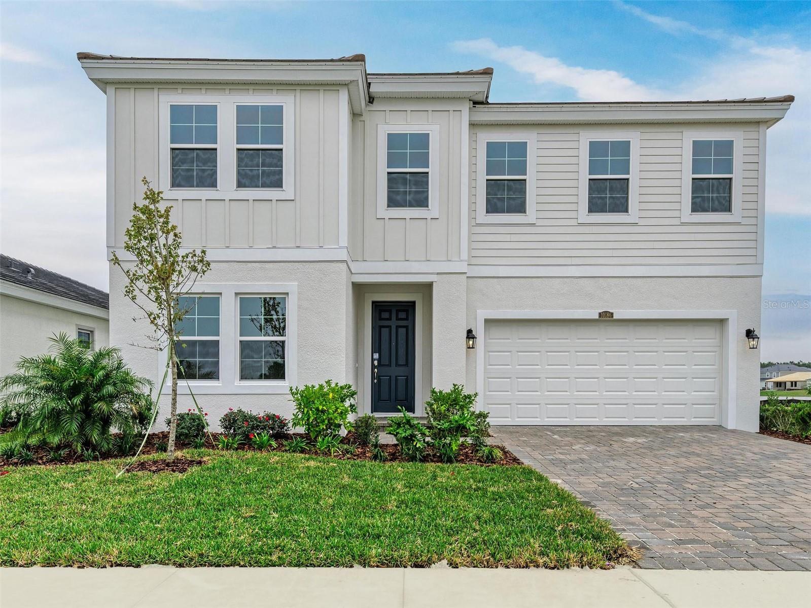 One or more photo(s) has been virtually staged. This Pelican is ready for move-in! This home showcases appealing finishes, including Sonoma Duraform Wood style cabinets, pristine Frost Whte MSI Quartz countertops, and durable Polaris Plus luxury vinyl plank flooring throughout the main areas. The Pelican is a generously sized and adaptable design, providing 3,381 square feet of thoughtfully planned living space. This expansive floorplan incorporates five bedrooms, three bathrooms, and a two car garage. The open concept layout ensures a seamless connection between the primary living spaces, achieving an ideal mix of comfort and practicality. Residents can enjoy a covered lanai providing beautiful views over the water. This design is further enhanced by a gourmet kitchen package and a convenient guest suite located on the first floor. The second story hosts the spacious owner's retreat, the laundry room, and the remaining secondary bedrooms. Listing Price amount for this Pending Sale includes Design and Structural Options.