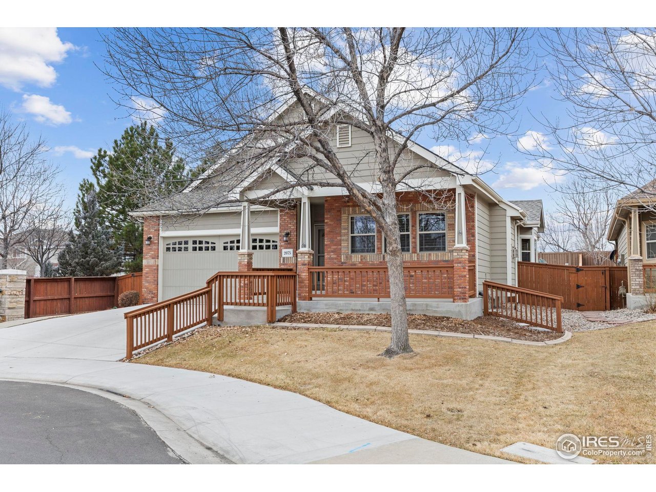 Exceptional Multi-Generational Home in Kendall Brook, Loveland! Discover the rare opportunity to own a meticulously maintained ranch-style residence in the prestigious Kendall Brook community of northwest Loveland. Designed for multi-generational living and those seeking privacy and flexibility, this home seamlessly blends classic elegance with modern convenience. The main floor offers a timeless three-bedroom, two-bath layout, featuring spacious living areas adorned with 3/4" hardwood floors, custom cabinetry with 42" uppers and crown molding, cathedral ceilings, granite and quartz countertops, and so much more. The finished garage and refined tile work further elevate the sense of quality throughout. The expansive finished basement is perfect for entertaining or accommodating guests, boasting a large recreation room, a fully equipped second kitchen, and a luxurious primary suite with its own private sitting area-ideal for extended family or visitors. Set in a tranquil cul-de-sac, the landscaped and irrigated yard is fully fenced and backs onto a private open space, offering both serenity and security. Enjoy Colorado's outdoor lifestyle year-round with covered front and back porches, enhanced by a Peterson Canvas shade for added privacy and comfort. Kendall Brook is renowned for its custom homes, mature landscaping, multiple parks, natural areas, and DIRECT access to the scenic 21-mile City of Loveland trail. The location provides a peaceful retreat while remaining close to all amenities. Recent upgrades include new windows throughout (2024), high-impact shingles on the roof (2025), and a newly replaced driveway and sidewalk (2023), along with numerous other value-adding improvements. Every detail reflects the owners' commitment to quality and care. 2075 Ridgway Court is more than a home-it's the perfect answer for those seeking the Colorado lifestyle of their dreams, with unmatched versatility, comfort, and enduring value.