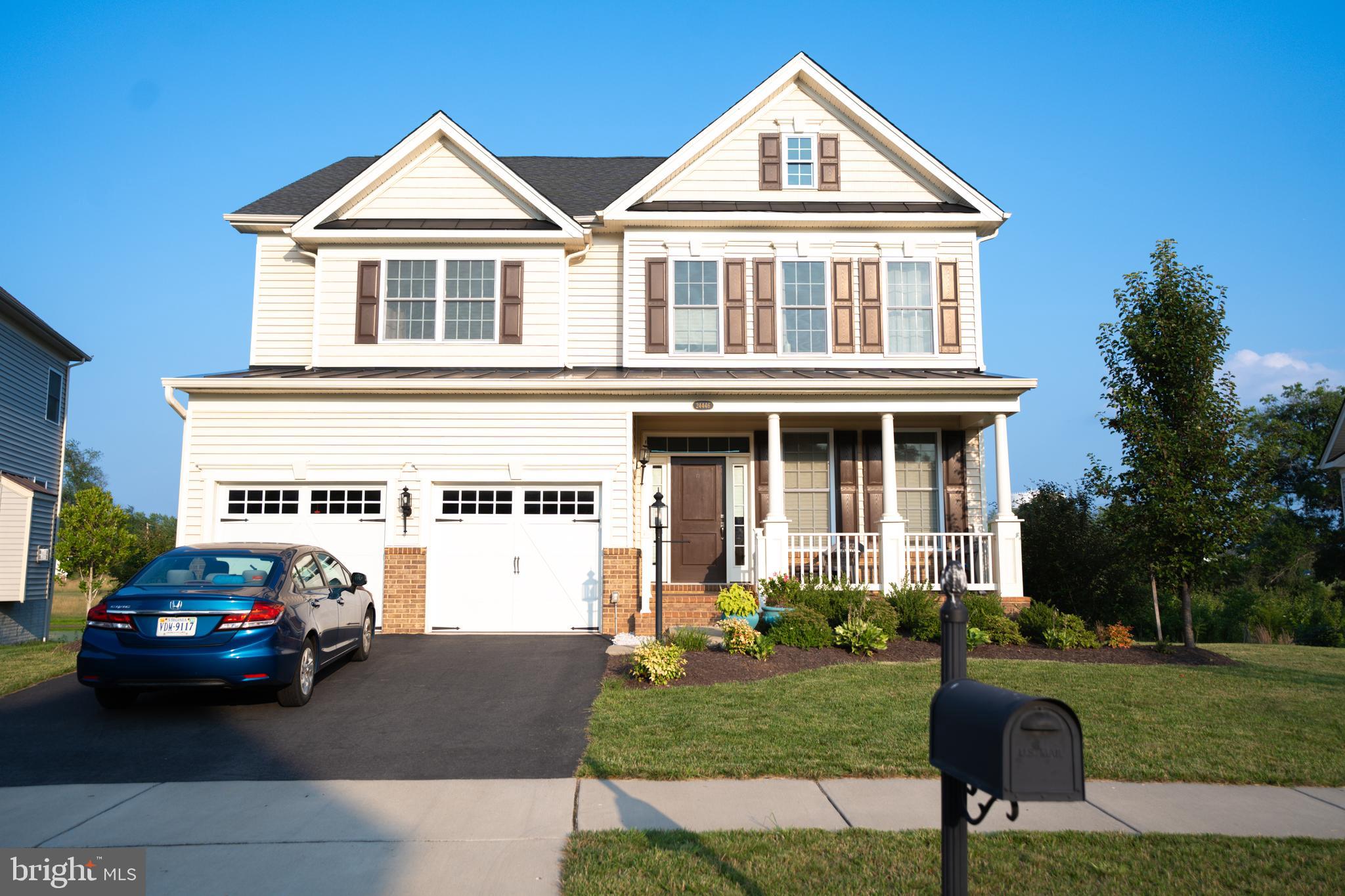 Gorgeous 4 Bedroom, 4.5 bath home with tons of upgrades throughout! Photos to be added on 7/20. Features include a welcoming front porch, front 2 car garage & private back yard with lake view. full of Hardwood flooring entire main level Formal Livingroom, dining room. kitchen with granite countertops, stainless appliances, breakfast room opening to a huge family room. The primary suite has a walk-in closet and luxury bath. The lower level has a kitchen & 4th full bath. So convenient to schools, shopping, parks, commuter routes and IAD. This is the one!