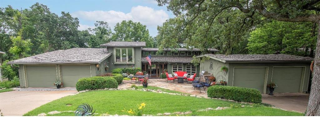 Unique & spacious Lake Quivira home offers a fantastic opportunity to live in a beautiful setting directly across from the picturesque golf course & moments from the front gate, clubhouse & owner's private dock #445. Beautifully updated thruout featuring 2 primary suites & walls of windows for stunning golf course views from Front & Back of Home. Designed w/entertaining in mind, the vaulted living/great rm boasts a dramatic wall of windows, fireplace & granite bar w/sink, & flows into the family/piano rm w/2nd fireplace & more views. The kitchen is beautifully appointed w/ granite & butcher block cntrs & hardwood floors, opening to the dining rm & cozy hearth rm w/3rd fireplace. Lower Level offers a large family room/ office w/wall of window & more golf course views + large, flexible living space perfect for media rm, or exercise area. The home has 4 large bdrms, including 2 primary suites w/full baths & LOTS of storage. Original home built in 1954.-Large addition & significant updates completed in 2000-added Great Rm (Living Rm), Primary Ste & LL Office/ Family Rm, Patio & Landscaping. Windows in original 3 Bedrooms on Main Level replaced & original Bathrooms updated & new fixtures added. Entire house repainted & new carpets added.New Roof-2017 /3 new HVAC 2022. Outdoor living offers flagstone front patio & entertaining space, back deck & patio. Car enthusiasts will appreciate the 4 garage spaces (2-car attached+2 detached). Located in the private community of Lake Quivira with a championship 18-hole golf course, 220-acre lake for boating/skiing/fishing/kayaking/sailing/swimming & 24/7 gated security. Add’l amenities -extensive nature trail system, equestrian facilities, full-service clubhouse & newer Community Center w/full workout facilities, lap pool, indoor/outdoor tennis & pickleball, exercise classes, walking track & more. The community also offers many clubs, activities, summer rec programs for kids & grandkids. 1x $40,000 membership fee & monthly HOA apply