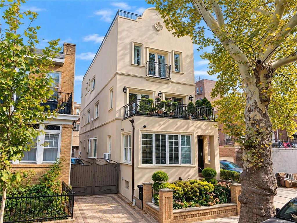 The Ultimate Bay Ridge Crown Jewel | Fully Remodeled 4-Story Luxury Multi-FamilyEnter into unmatched luxury with this one-of-a-kind, 4-story, 2-family residence in the heart of coveted Bay Ridge. Meticulously rebuilt with concrete and brick construction under a sleek stucco façade, this architectural masterpiece blends suburban space with high-end urban sophistication.The Triplex (Owner’s Paradise):4th Floor: A sun-drenched oversized bedroom opening directly onto a private rooftop oasis, complete with panoramic views of Bay Ridge, an expansive deck, and a premium 8-person Sundance Aspen hot tub.3rd Floor: A grand primary suite featuring a private Juliet balcony, a massive custom dressing room, and a spa-inspired bath with double vanities, a multi-jet shower, and a Jacuzzi with an integrated TV. Includes a spacious bedroom, an additional full bath, and a dedicated laundry area.2nd Floor: Soaring 9ft ceilings, a state-of-the-art chef’s kitchen with solid wood cabinetry and granite countertops, and an open-concept living/dining space centered around a stunning multi-sided fireplace. Come right out onto your private balcony.The Garden Duplex (Income Stream):Features 3 spacious bedrooms and 2.5 baths with high ceilings, a chef-grade kitchen with a large walk-in pantry, and a radiant-heated lower level. Perfect for entertaining, complete with a kitchenette, a half bath.Smart Home & High-End Features:Anderson windows, full central A/C, and radiant-heated flooring in the lower level.Pre-wired smart home: Built-in whole-house sound system, dedicated server hub, network connectivity, and full CCTV security.Power generator ready, central vacuum system, in-unit laundry for both residences, and premium hardwood flooring with custom crown molding throughout.