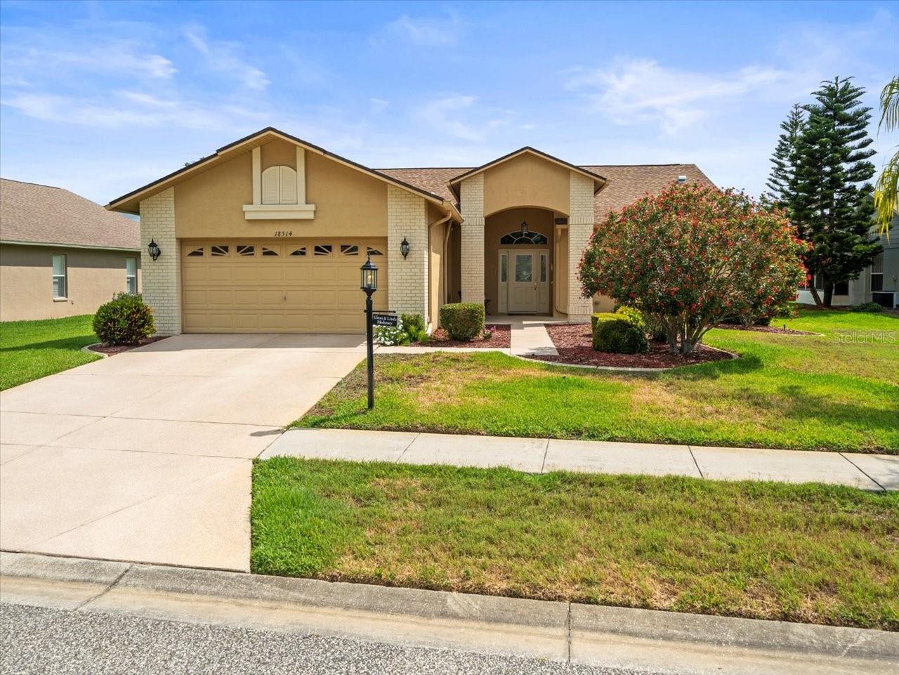 Close to restaurants! Come enjoy luxurious living in Heritage Pines, the highly sought-after gated development. Located just off County Line Rd. This appealing 3-bedroom, 2-bathroom charmer offers a Traditional home's ideal proportions and sight lines. The location is just a short drive to shopping and dining options. Low-travel commute to Tampa. Across the threshold, nice touches include a splendid entryway, neutral decor, and minimalist flat 10 ft. high ceilings. With ample room for food prep, the kitchen is bright with natural light, Corian counters, and ample pantry space. The serene primary bedroom includes two walk-in closets and a full bath with an oversized shower. The other two bedrooms are quiet and designed with plenty of wardrobe storage and a Jack & Jill full bath with an oversized shower.  Attached extra-deep two-car garage that will accommodate most vehicles.  A screened back porch is perfect for beverages and conversation. This one is the right house at the right time for you.