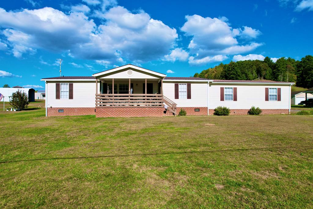Country living at its best! This beautiful home offers 3 bedrooms with 2 full bathrooms. It has 1400 sq feet of living space as well as an attached 2 car garage. The lot is over 2 acres and is completely flat offering many opportunities for gardening or fencing for pets. The large shed is a great space to store your gardening supplies or mowers. Come sit on the front porch and enjoy the peace of the country!