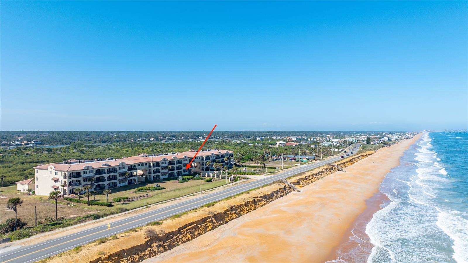 Coastal living at its finest awaits at Oceanside Condominiums. This fully furnished oceanfront END-unit in Flagler Beach offers stunning Atlantic Ocean sunrise views and Intracoastal Waterway sunsets. Featuring spacious 3 bedroom ensute bathrooms at 1,919 square feet of living with an open floor plan, wood flooring in bedrooms and tile flooring in living space including the bathrooms,solid wood cabinetry, granite counter tops, breakfast bar. wet bar with wine cooler to entertain and plantation shutters throughout. The primary suite offers addtional space for a sitting area or a home office with serene ocean views. The primary ensuit bath includes a jet soaking tub, large tile glass shower, dual granite vanities, prive water closet, oversized walk in closet with motion sensor lighting. Abundant closets throughout with its own laundry room that includes more cabintry, granite counter top and motion sensor lighting. This unit has 2 deeded assigned garage spaces w/ additional guest parking at the pool. 7 day rentals are allowed with Coastal Realty Vacation Rentals registered w/ Florida Department of Business & Professional Regulation. Amenties include gated community,elevators, covered garage, extra storage space for beach accessories or golf equipment, community pool (heated in winter months), spa, dog park, kayak launch at the Intercoastal WaterWay, deeded beach access. Grocery, shops, farmer market on Saturdays in Flagler Beach, & amazing resturants to enjoy freah seafood, live music and Ocean views! What more could you ask for weather you want to make this your primary or vacation rental to make potential income! Price improvement! Don't miss out & schedule your private tour TODAY!