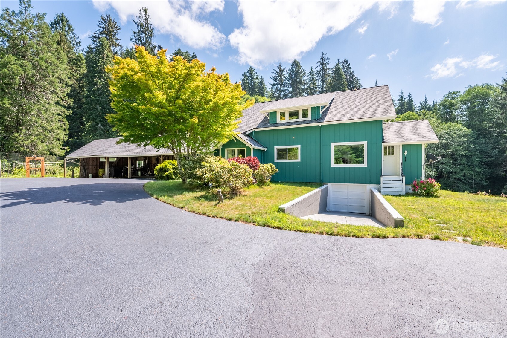 Beautifully secluded farmhouse set on over 28 picturesque acres, offering four spacious bedrooms, one and a half baths, and timeless Northwest charm. This scenic property features the perfect blend of open pasture and peaceful woods, creating an ideal country retreat.  Recent updates include a NEW roof, NEW windows, NEW flooring and fresh interior and exterior paint, making this home move-in ready while preserving its original character. The charming kitchen is warm and inviting as is, or offers the perfect opportunity to customize and create your dream space.  Inside, you’ll find custom built-ins, beautiful woodwork throughout, a welcoming living room, and an additional family room for flexible living. The main-level primary suite features a private bath, a large closet and direct access to the deck—perfect for enjoying your morning coffee while taking in the peaceful surroundings.  The walkout unfinished basement provides abundant storage and endless potential. Outside, the property includes a large shop with power, a barn, ample paved RV parking, a fenced garden area and numerous fruit trees, including peach, nectarine, fig and apple, all surrounded by stunning views.  Conveniently located near hiking trails, fishing, and the coast, this exceptional property offers the perfect balance of privacy, recreation and country living. Don’t miss this rare opportunity—schedule your private tour today!