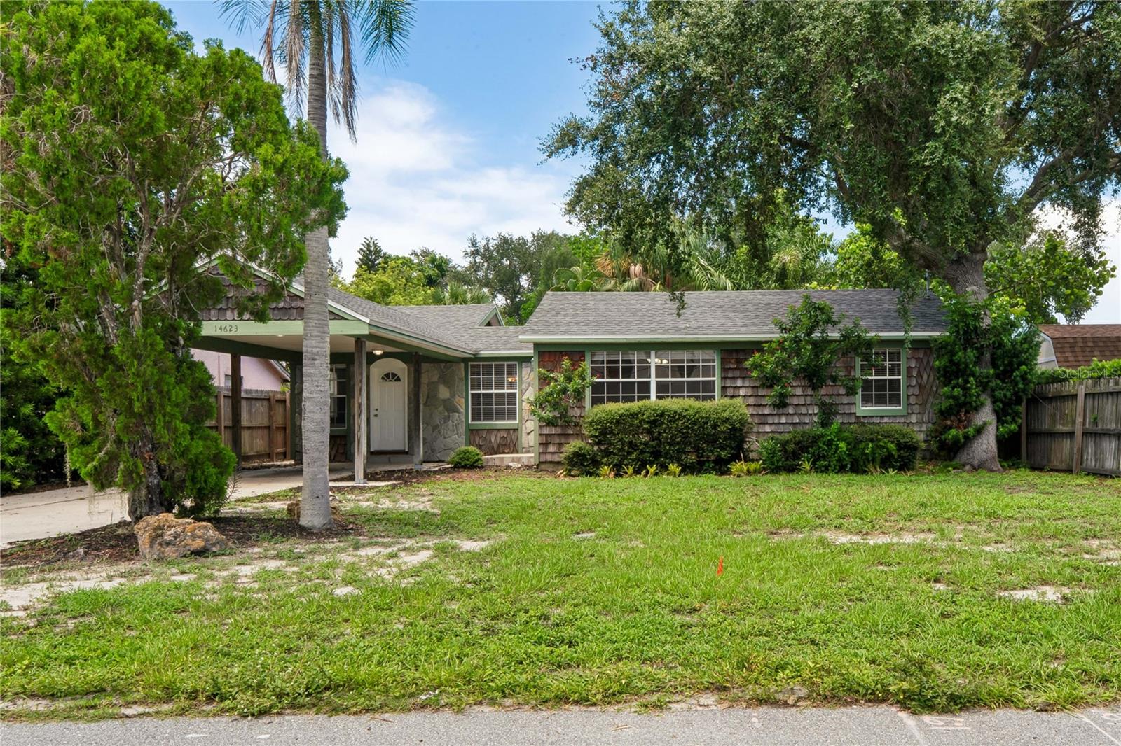 Welcome to 14623 Sunset Dr! This 3-bedroom, 2-bathroom property offers over 1,600 square feet of living space, a dedicated laundry area, and a fenced-in backyard!! The home is move-in ready with luxury vinyl plank and tile flooring throughout as well as a kitchen that includes white shaker-style cabinets, quartz countertops, and stainless steel appliances. The floor plan provides plenty of room for entertaining with the living room, family room, and dining room flowing seamlessly into each other and the kitchen. The primary bedroom offers easy access to the primary bathroom with a walk-in shower with custom tilework. The additional bedrooms share the second full bathroom. Conveniently located near schools, shopping, and major roadways. Call to schedule a showing today!