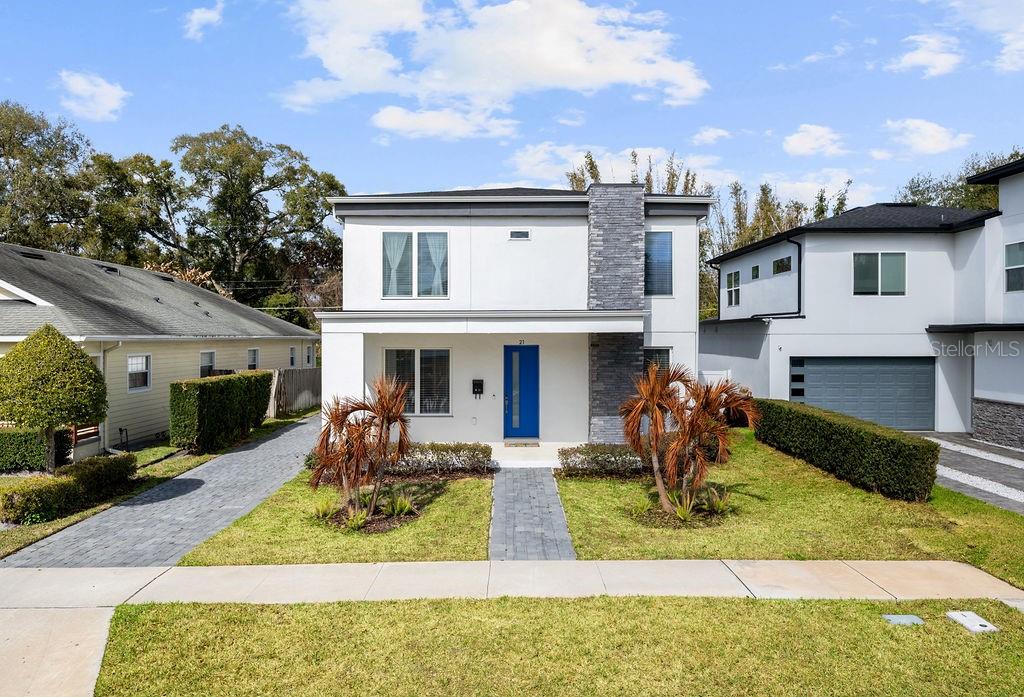 One or more photo(s) has been virtually staged. Welcome to an elegant contemporary residence located in the heart of Orlando’s highly sought-after College Park area. This beautifully appointed home offers 5 bedrooms, 3 full bathrooms, and a detached 2-car garage, fully furnished,  blending modern design with refined comfort.Offered fully furnished, this turnkey property showcases thoughtfully curated interiors, open-concept living spaces, and upscale finishes throughout, perfect for both everyday living and elevated entertaining. The private office / bedroom has been partially virtual staged to illustrate its flexible potential as a workspace, creative studio, or additional in law suite.  This property is ideally positioned just minutes from AdventHealth Orlando, UCF Downtown Campus, and Dr. Phillips Center for the Performing Arts, you’ll enjoy effortless access to Orlando’s premier dining, shopping, and cultural destinations. The home is also a short bike ride to the Packing District Orlando, featuring planned walking and biking trails, retail, food halls, and a state-of-the-art YMCA of Central Florida.A rare opportunity to own a furnished, move-in-ready luxury home in one of Orlando’s most desirable neighborhoods. Schedule your private showing today.DISCLAIMER: Office space is partially virtual staged.