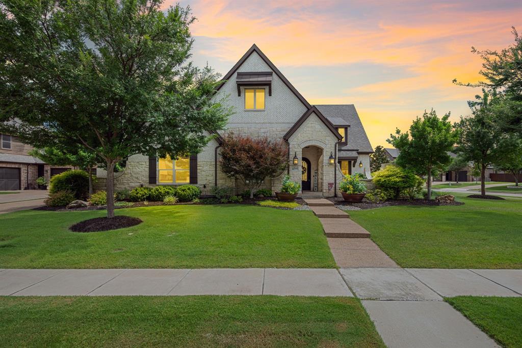 Outstanding open concept, 1.5 story floor plan! Oversized north-south corner lot! Gorgeous landscape, light brick & front courtyard exude curb appeal! Loaded with upgrades including plantation shutters, extensive wood floors, updated paint in SW 'snowbound thru-out! Study with painted blt-ins & French doors to the front courtyard add interest!  Formal dining & adjoining butlery with wine cooler! The island kitchen is a stunner with white cabinetry, contrast painted center island, upgraded Kitchen Aid appliances incl: B-I fridge, dbl ovens, professional series 6-burner range + griddle, gorgeous granite & quartz with herringbone tile bksplash! The kitchen flows seamlessly into the oversized family room which features stone fireplace, wood floors & a wall of plate glass windows rendering natural light! At the back of the home is the primary BR with tray ceiling & sitting area opening to the patio! The primary bath is outfitted with free-standing soaker tub, W-I shower, elegant floor tiles, quartz vanities & large W-I closet. There are 3 additional BRs on the main level: one with ensuite bath & the other 2 with J & J bath (all with quartz vanities). The 2nd level offers a large game room + half bath - flexible space! The 2022 addition of the swimming pool is the icing on the cake: oversized saltwater pool with smart controls, tanning ledge, 3 sheer descent w'falls! Gorgeous bkyard landscape frames it all so beautifully! Enjoy it all from the covered travertine patio & outdoor kitchen! 3 garages are equipped with epoxy floors & built-in wall storage system in the 2-car garage! This one is a show-stopper!
