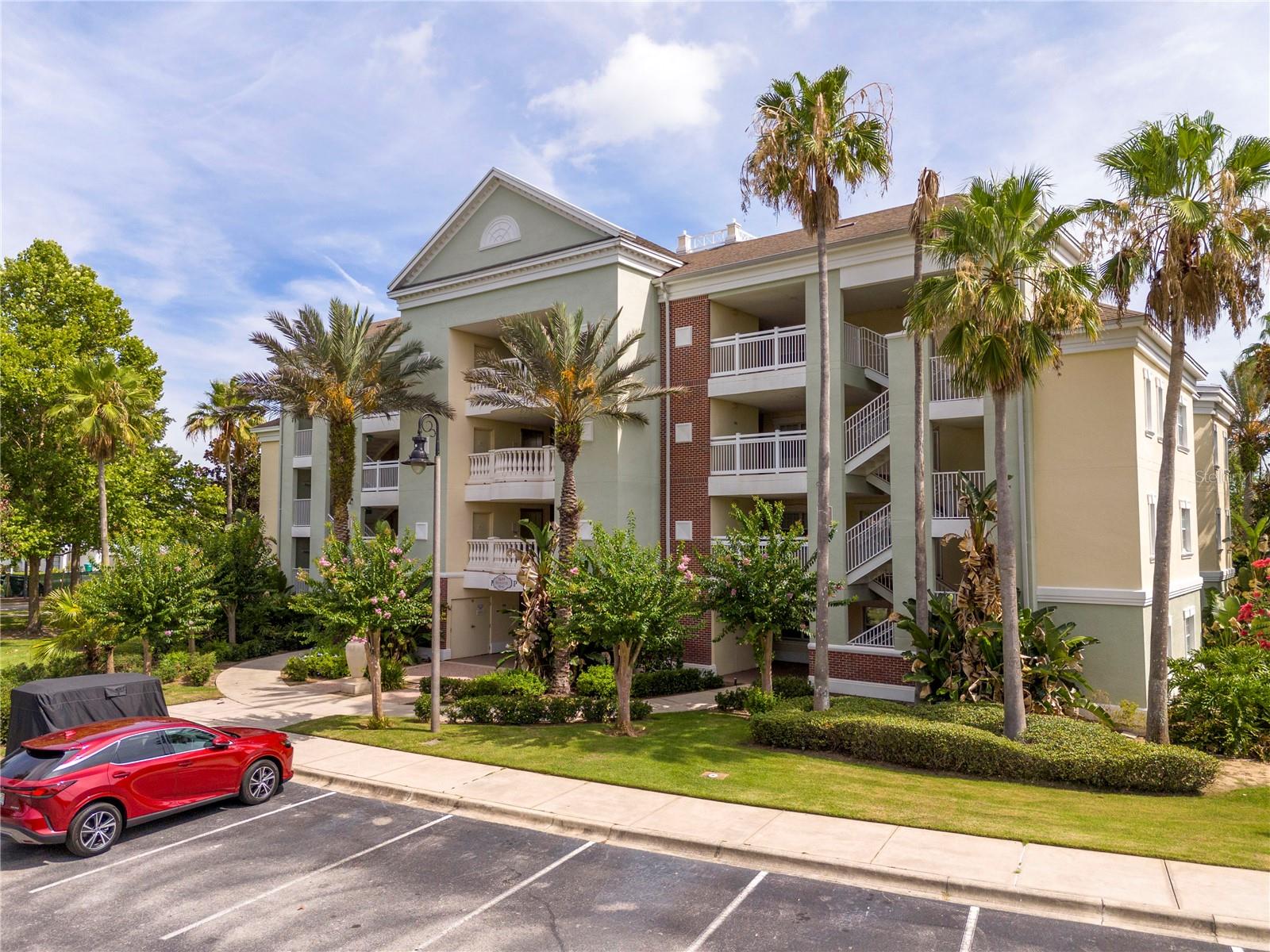 Experience resort-style living and exceptional investment potential in the heart of Reunion Resort. This spacious 3-bedroom, 3-bath condominium is located in the sought-after Villas at Reunion Square, a community that allows short-term rentals, making it an ideal vacation home, income-producing property, or full-time residence. Reunion's Villas neighborhood consists of three-bedroom condominiums with access to a community pool and playground within the renowned resort community. Step inside to find an open-concept floor plan designed for comfort and entertaining, featuring a spacious living and dining area, a well-appointed kitchen, and private outdoor space perfect for enjoying Florida's year-round sunshine. The split-bedroom layout provides privacy for owners and guests alike, while each bedroom offers access to its own full bathroom. Located just minutes from Walt Disney World, Reunion Resort is one of Central Florida's premier vacation destinations, offering world-class amenities, championship golf courses designed by Arnold Palmer, Tom Watson, and Jack Nicklaus, multiple pools, dining options, walking trails, fitness facilities, and a renowned water park. Whether you're looking for a personal vacation retreat, a turnkey short-term rental opportunity, or a primary residence in a gated resort community, this property delivers the perfect combination of luxury, location, and flexibility.