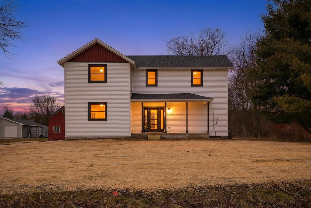 Welcome to 7900 Napoleon Rd, where timeless farmhouse charm meets a masterfully curated transformation. Taken down to the studs and rebuilt with intention, this residence offers the rare confidence of brand new systems and refined finishes throughout while preserving its original character. A gracious foyer welcomes you into a chef-inspired kitchen designed for effortless entertaining, flowing seamlessly into a spacious formal dining area. The inviting living room is anchored by the original fireplace, enhanced with an electric insert for year round warmth and ambiance. The main level primary suite is a private retreat behind elegant French doors, filled with natural light and complemented by a spa like ensuite featuring a stunning walk-in tile shower and exceptional storage. Upstairs, a cozy bonus family room adds versatility. Set on one acre with two barns, this property is ideal for elevated country living. Showings begin 2/18.