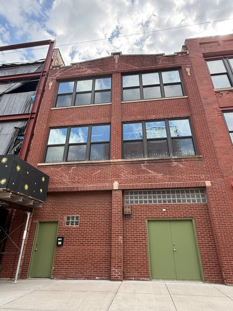 9,000 Sq. Ft. Building with 30' Ft. frontage. Three stories of open, clear-span loft space offering 3,000 Sq. Ft. per floor, making it flexible for a wide range of uses. 12' Timber Ceilings with Steel I-Beams and Exposed Brick. Full basement with 8-9 ft ceilings. Freight Elevator Access to All Floors. Currently configured as a warehouse/artist studio on the retail level with a residential home on floors 2 and 3 - live, work, invest, or reimagine entirely. Central Heat and Air Throughout and Multiple Hot Water Tanks. Owner's unit features a full kitchen, two full baths, and in unit washer/dryer, making it move-in ready. Updated 3-phase electric, gas and water service, and a full sump pump system in the basement, with many other infrastructure updates completed over the years. Roof access from the 3rd floor -Potential to add Roof Deck or 4th floor Expansion. Centrally Located in the Heart of the West Loop Neighborhood and on Historic Fulton Market Street. 1/2 Mile to Multiple L Stops and Access to Kennedy Expressway. Area Tenants Include: Google Headquarters, Soho House, Nobu Hotel, Herman Miller, Fjallraven, Publican, Rose Mary and Many More. One of the hottest addresses in the entire country, perfect for any business or for those wanting to be at the epicenter of everything the West Loop has to offer.