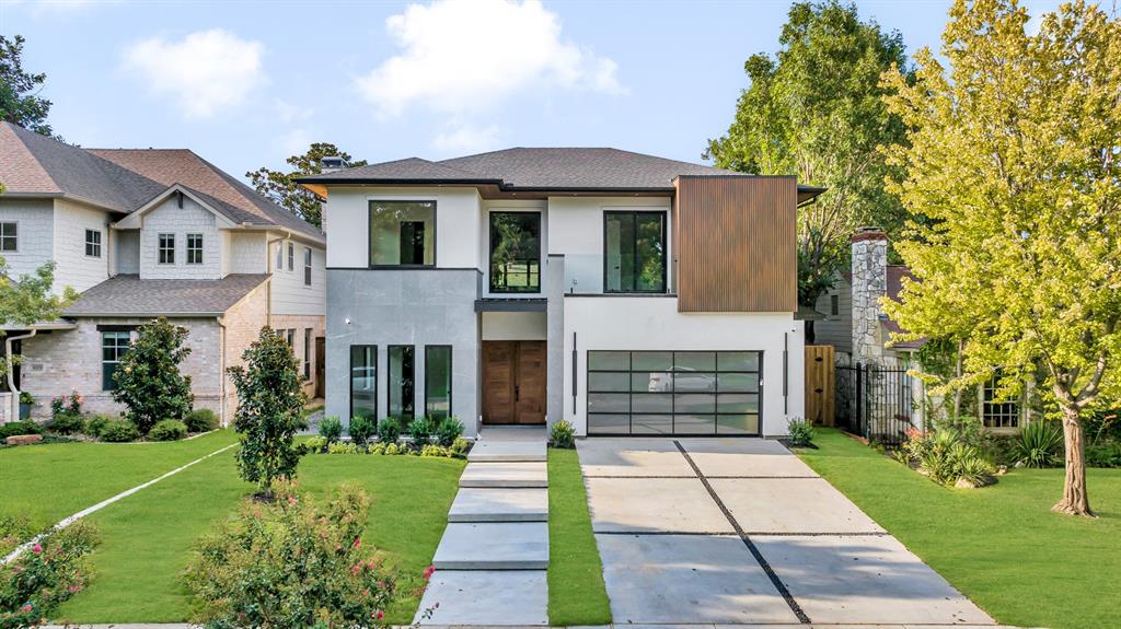 Experience luxury living in this one-of-a-kind 5-bedroom, 5-bathroom modern home, where thoughtful design and high-end finishes define every space. Nestled on a picturesque, tree-lined street in one of East Dallas’s most desirable neighborhoods, you’re just a short walk to parks, dining, and local favorites.Step inside to white oak hardwood flooring throughout and soaring ceilings anchored by custom chandeliers. The open-concept layout highlights a show-stopping floating staircase with glass railing and LED lighting, complemented by Quaker windows and doors that flood the home with natural light.The chef’s kitchen features quartz countertops with a waterfall island, a full butler’s pantry, and top-of-the-line Thermador commercial appliances. Smart home technology and built-in surround sound elevate functionality, while custom flush cabinetry, designer tiles, and sleek hardware showcase exceptional craftsmanship.The spacious primary suite is conveniently located on the first floor, offering a luxurious retreat with a spa-inspired bath and a custom walk-in closet. Upstairs, an oversized game room with a built-in bar provides the ultimate entertainment space.Outdoors, enjoy a custom swimming pool surrounded by low-maintenance turf, perfect for relaxing or entertaining.This home is truly unmatched in detail, design, and location—modern living at its finest in the heart of East Dallas.