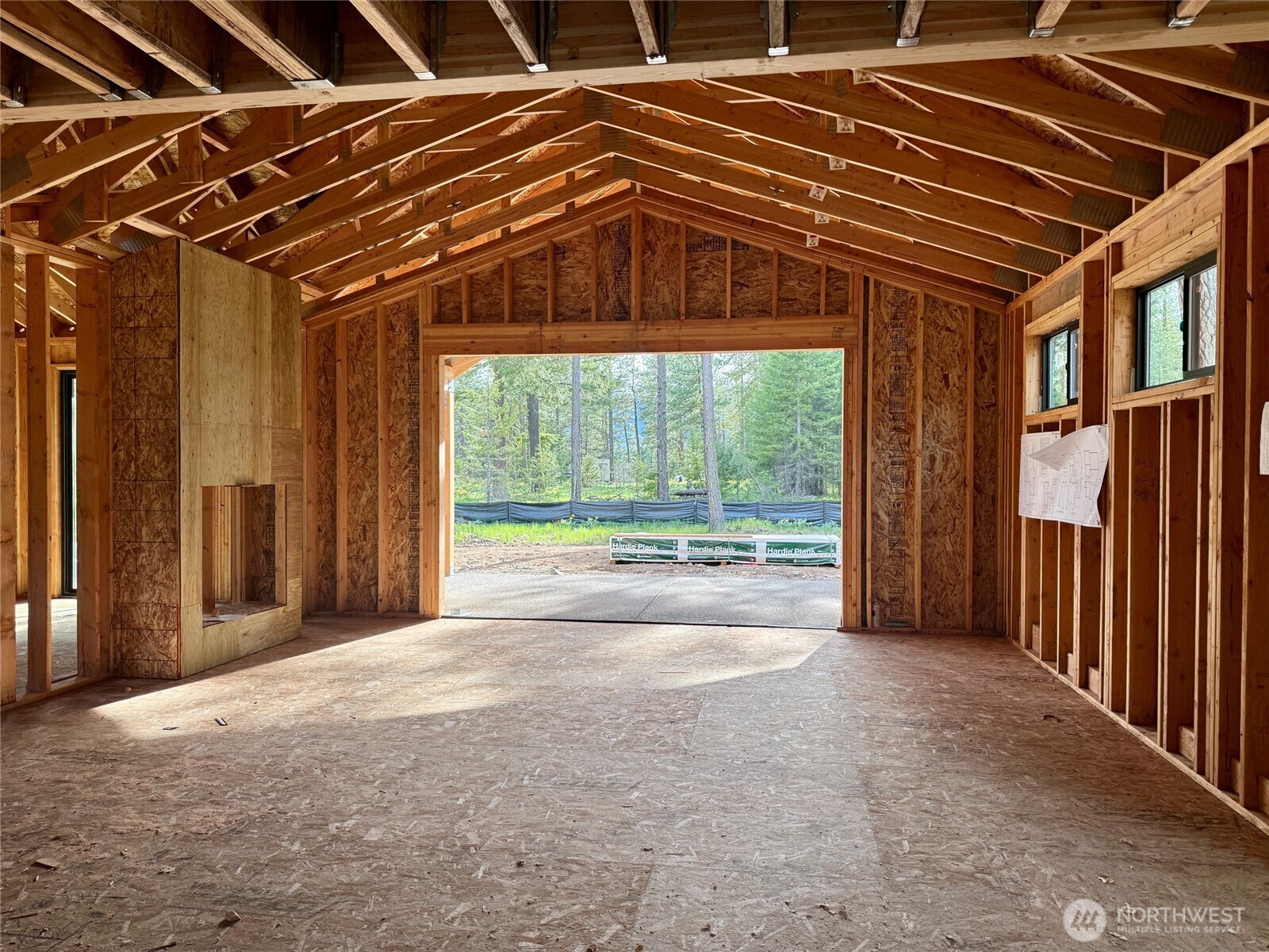 great room concept with large sliding doors to covered patio.