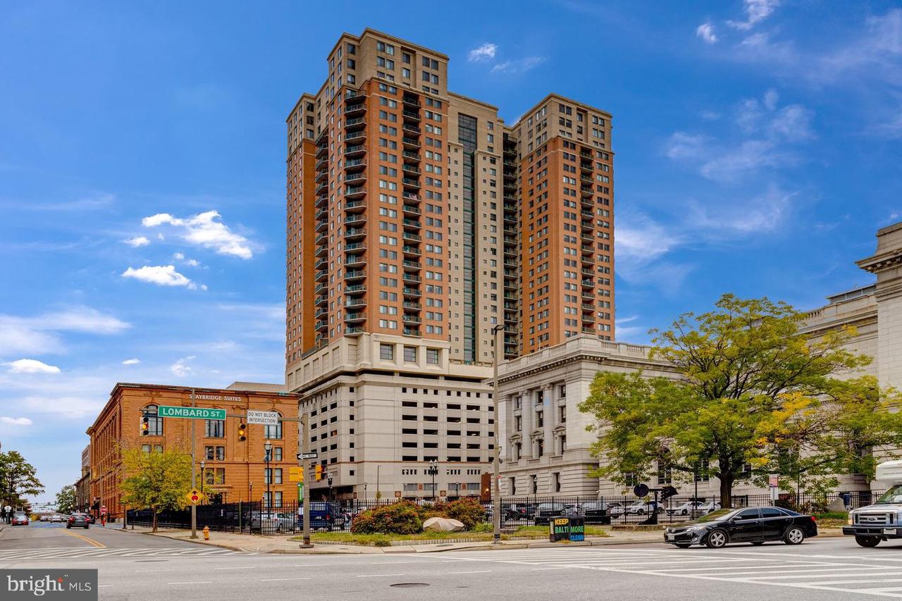 Enjoy elevated city living from the 29th floor of 414 Water Street. This well-maintained one-bedroom, one-bath condominium features an open living and dining area, a functional kitchen, generous natural light, central air conditioning, and expansive views of the Baltimore skyline. The efficient floor plan offers approximately 631 square feet of comfortable living space with convenient in-unit laundry.Building amenities include 24-hour concierge/front-desk service, a fitness center, outdoor swimming pool, resident common areas, and secure garage parking. Conveniently located near the Inner Harbor, Harbor East, downtown dining, shopping, entertainment, public transportation, and major commuter routes.